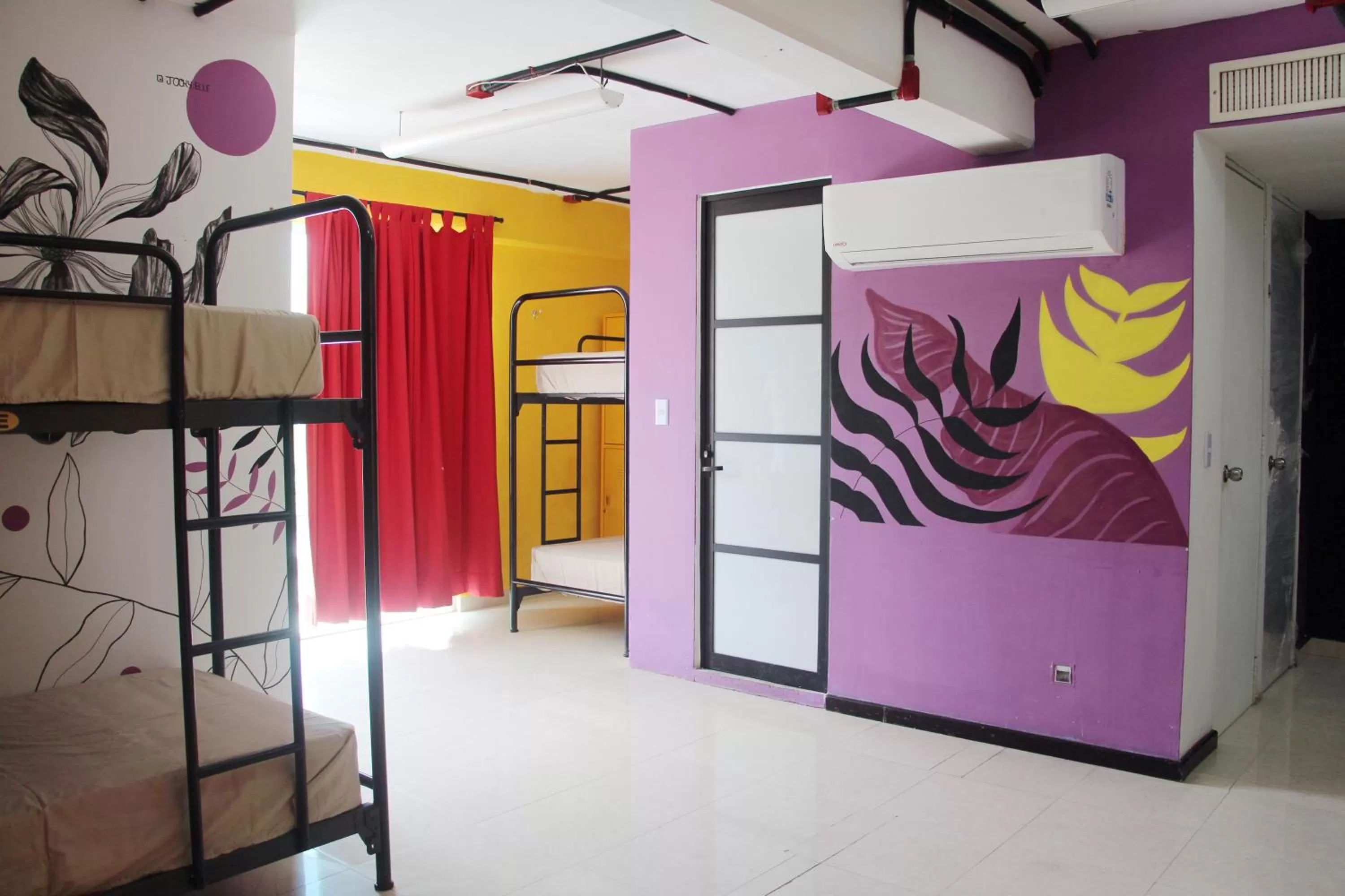 Photo of the whole room, Bunk Bed in Hotel & Hostal Casa de Luz Cancun