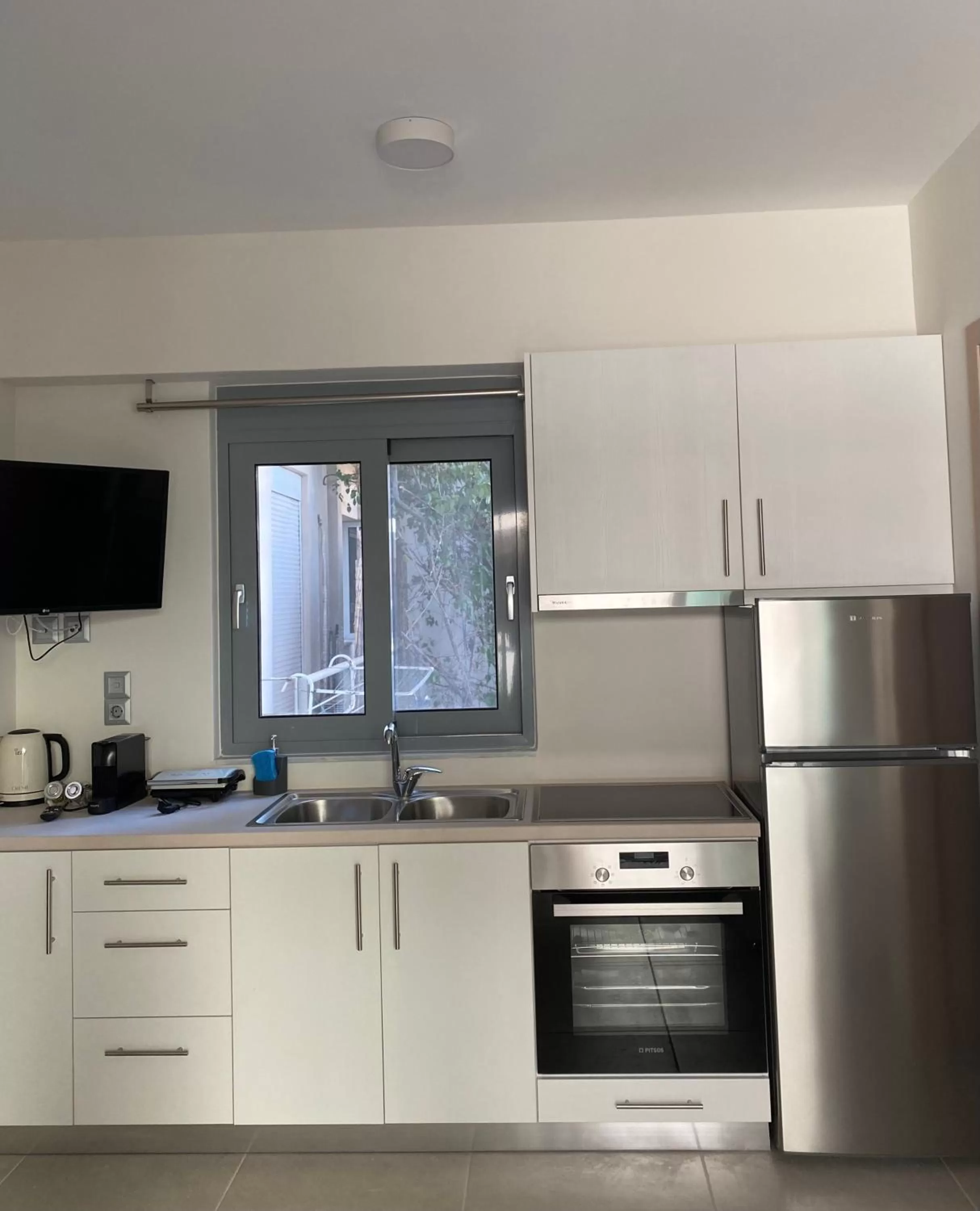 Kitchen or kitchenette in Cottage Boutique Apartments Athens