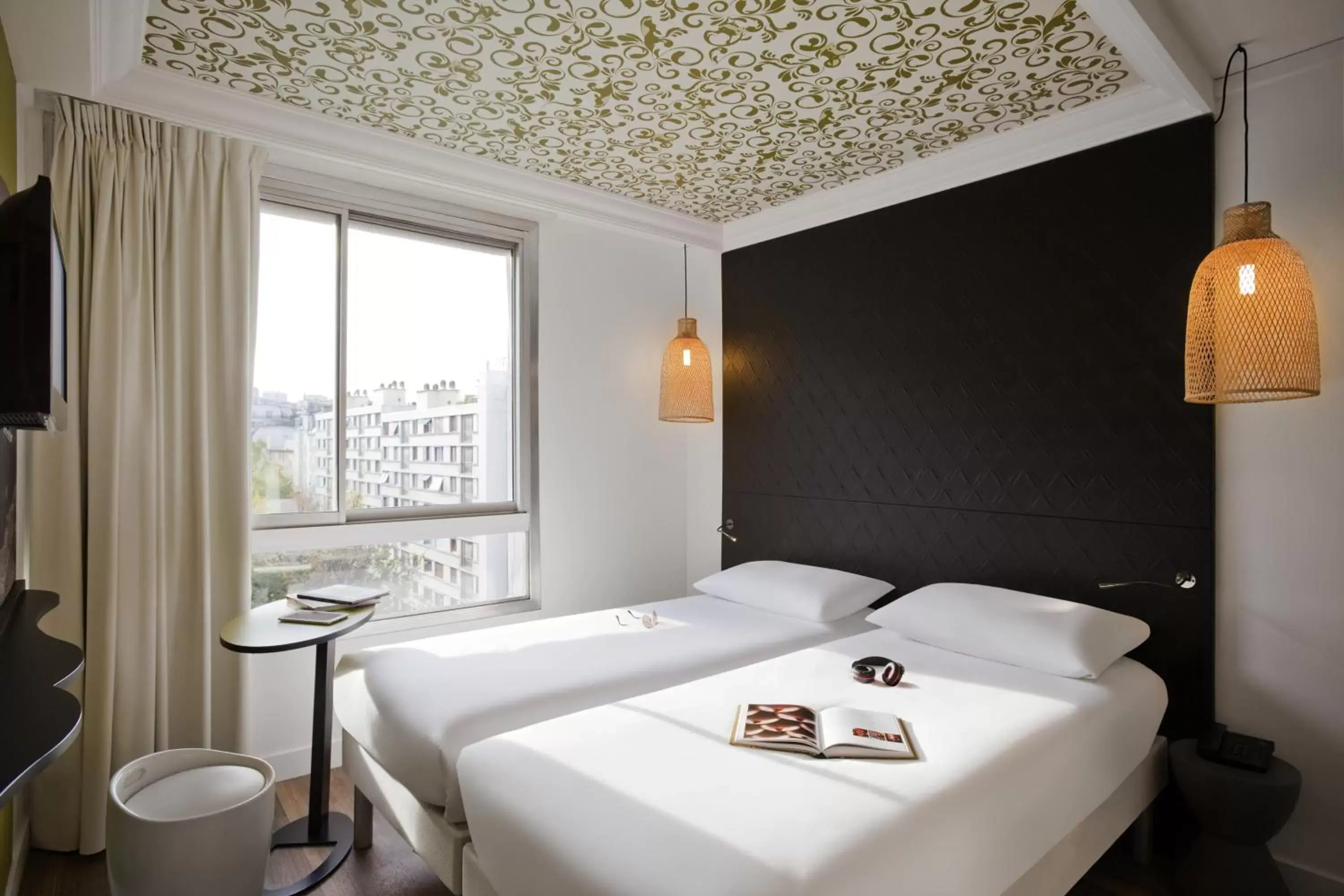 Decorative detail, Bed in ibis Styles Paris Buttes Chaumont