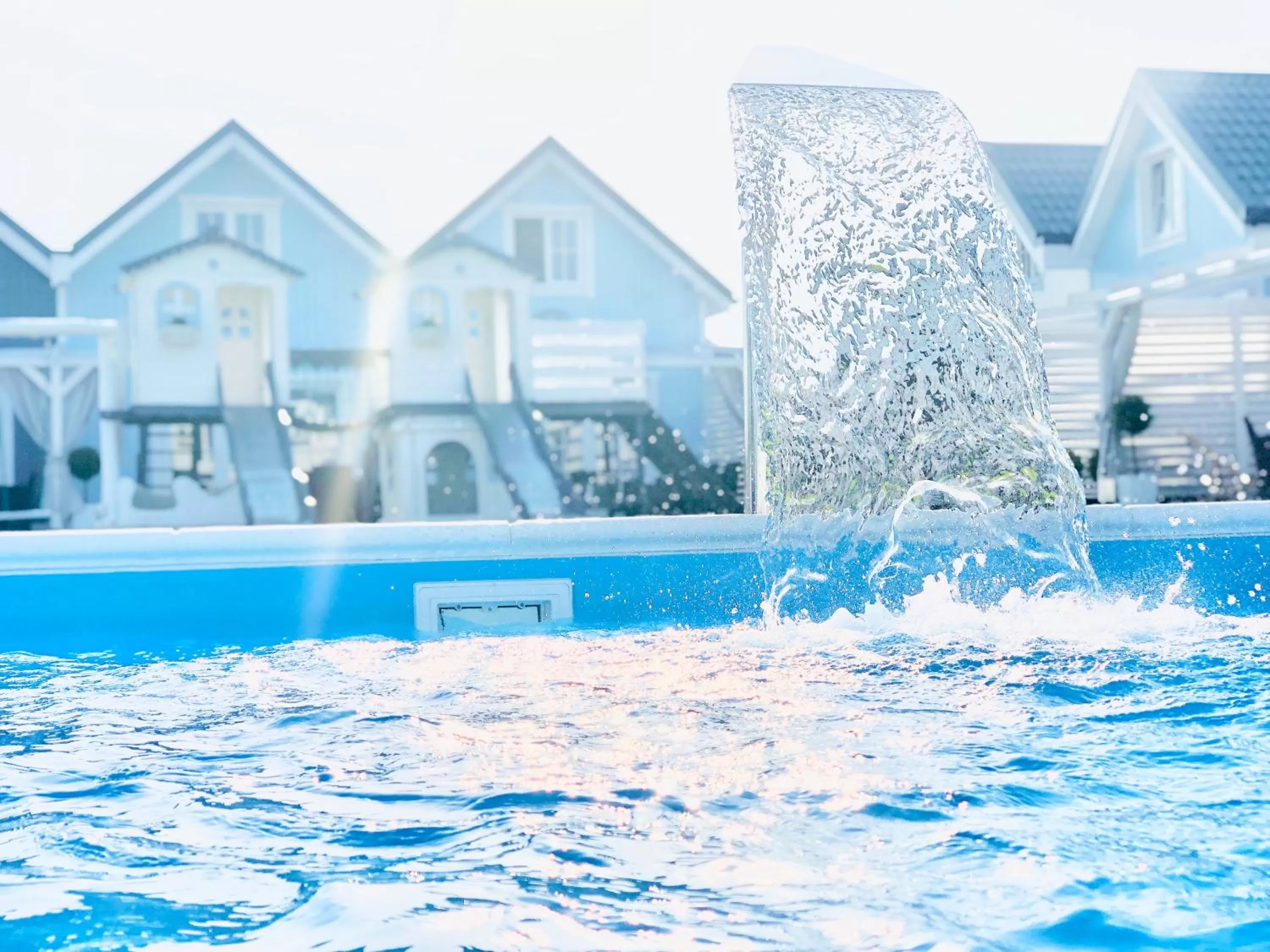 Property building, Swimming Pool in Baltic Family - domki całoroczne nad morzem basen kidsclub rowery