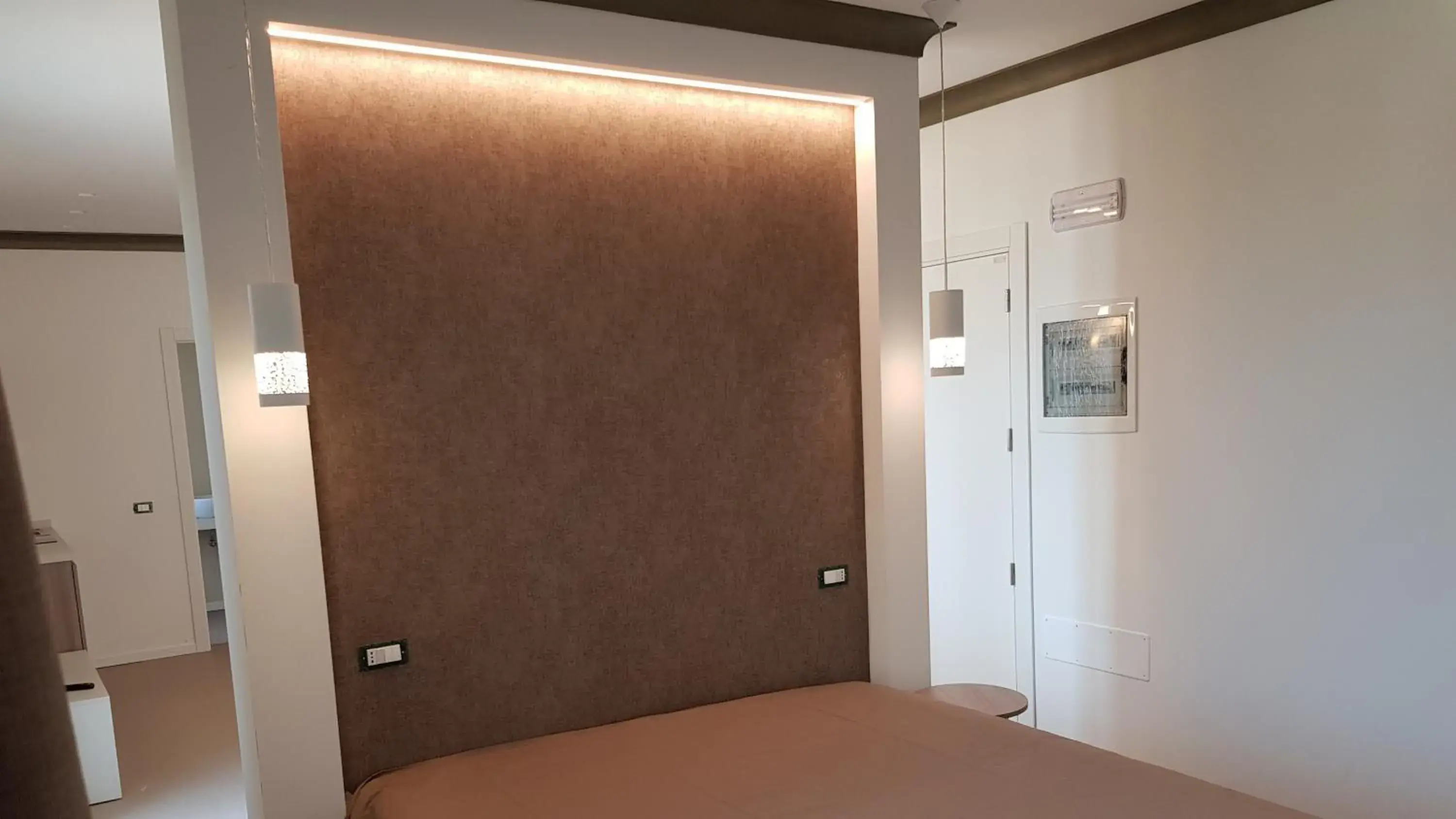 Bed in Residence Hotel Venus Suites