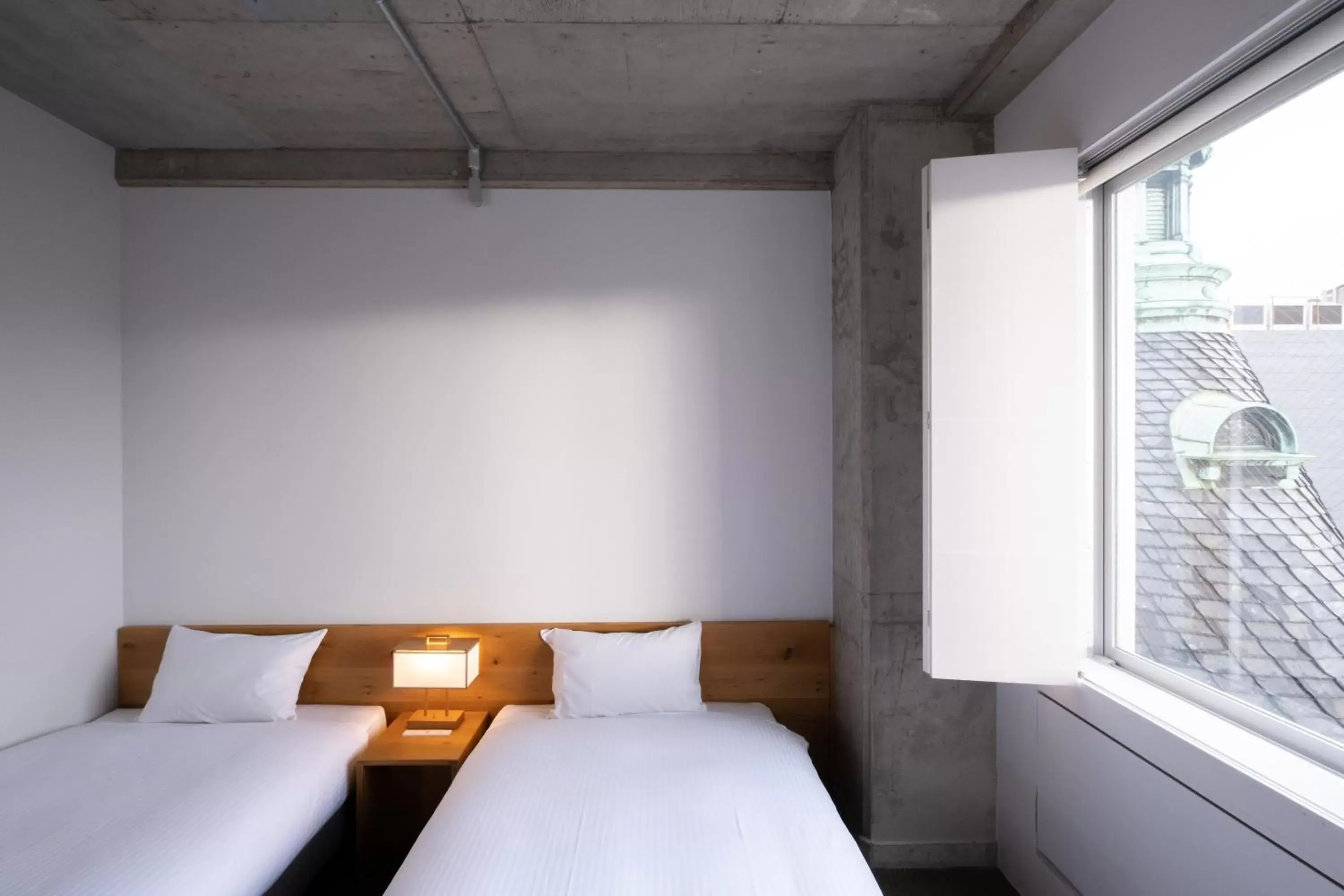 Photo of the whole room, Bed in TSUGU Kyoto Sanjo by THE SHARE HOTELS