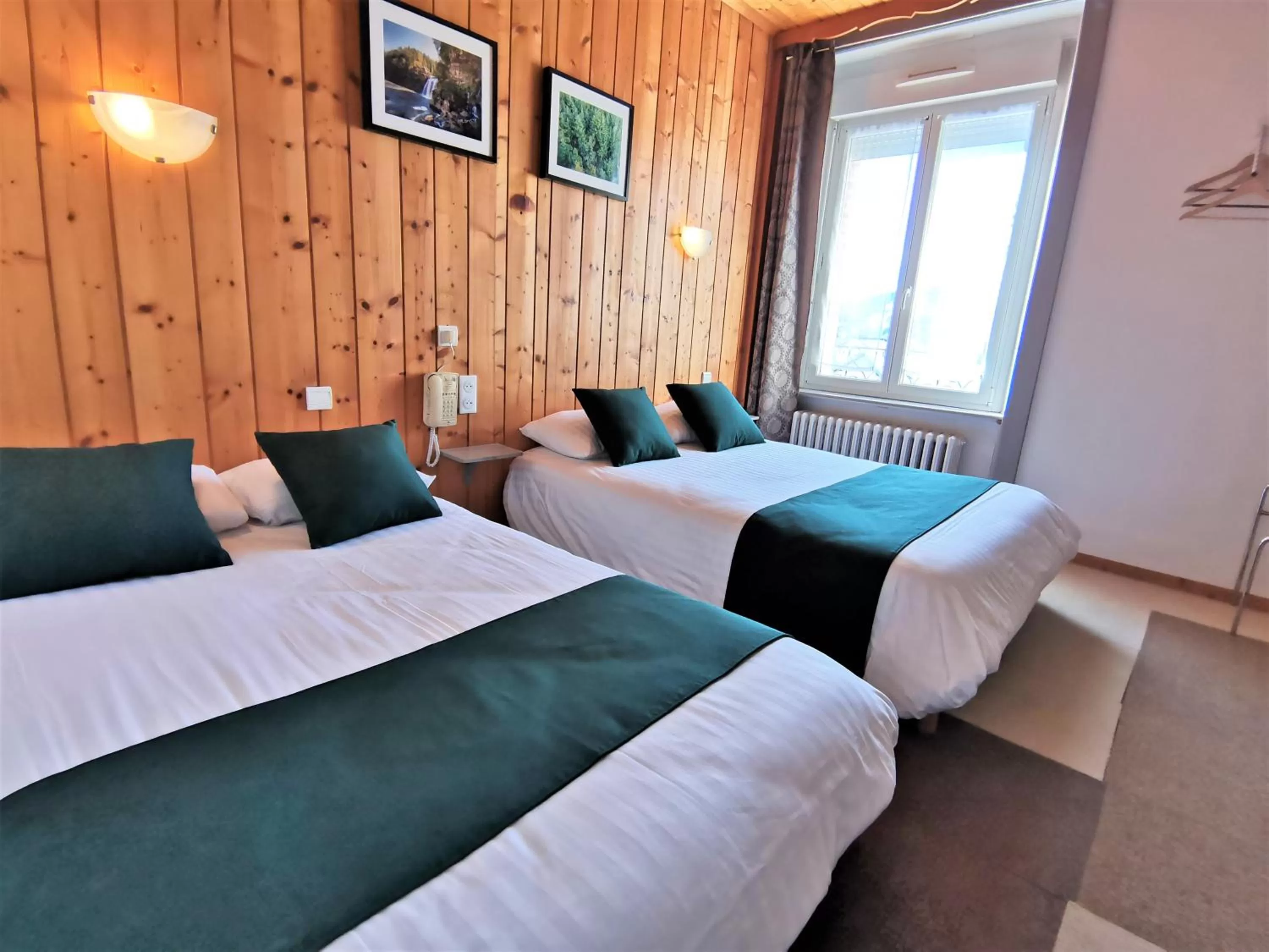 Bed in Hotel Les Montagnards