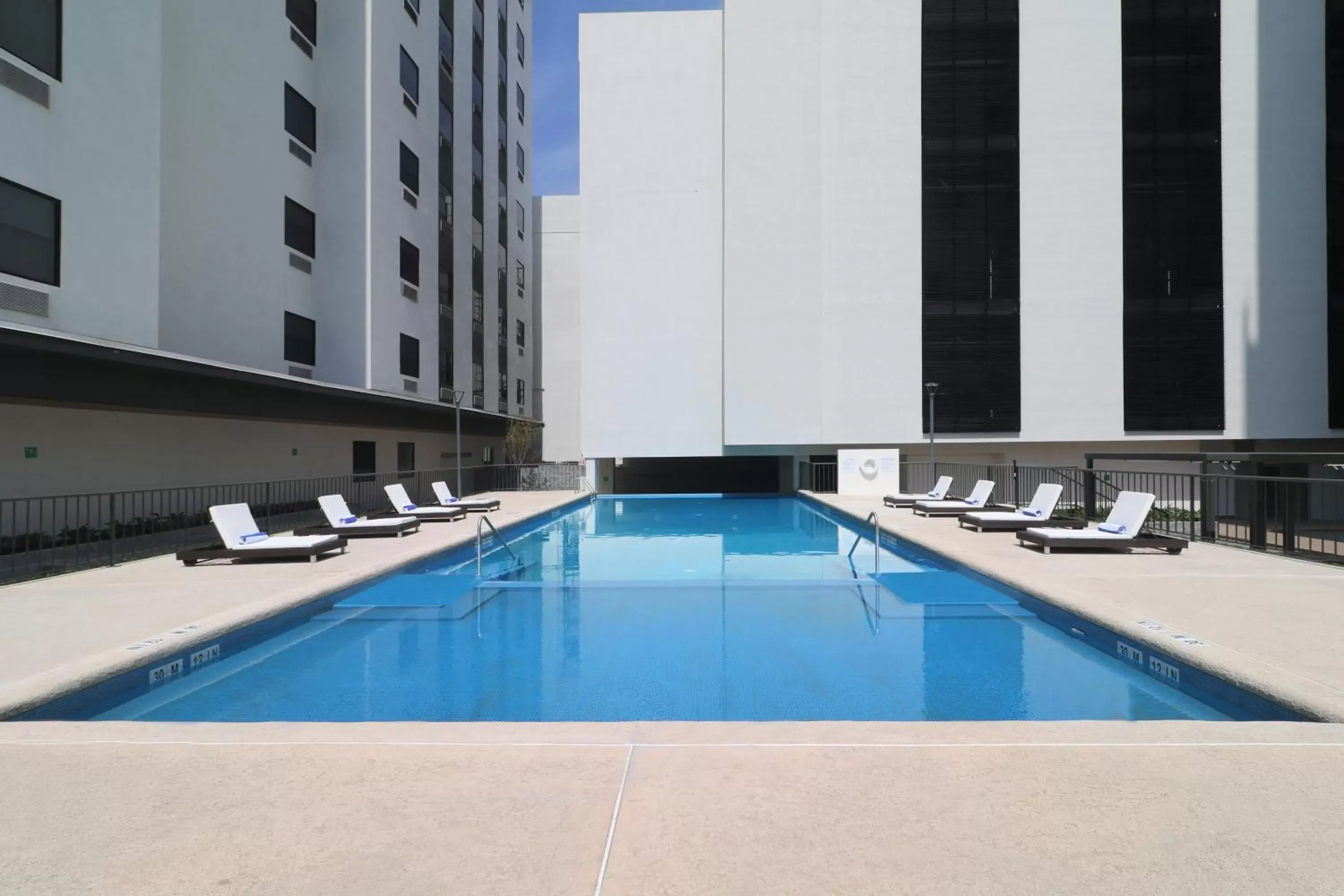 Swimming Pool in Holiday Inn & Suites - Monterrey Apodaca Zona Airport, an IHG Hotel