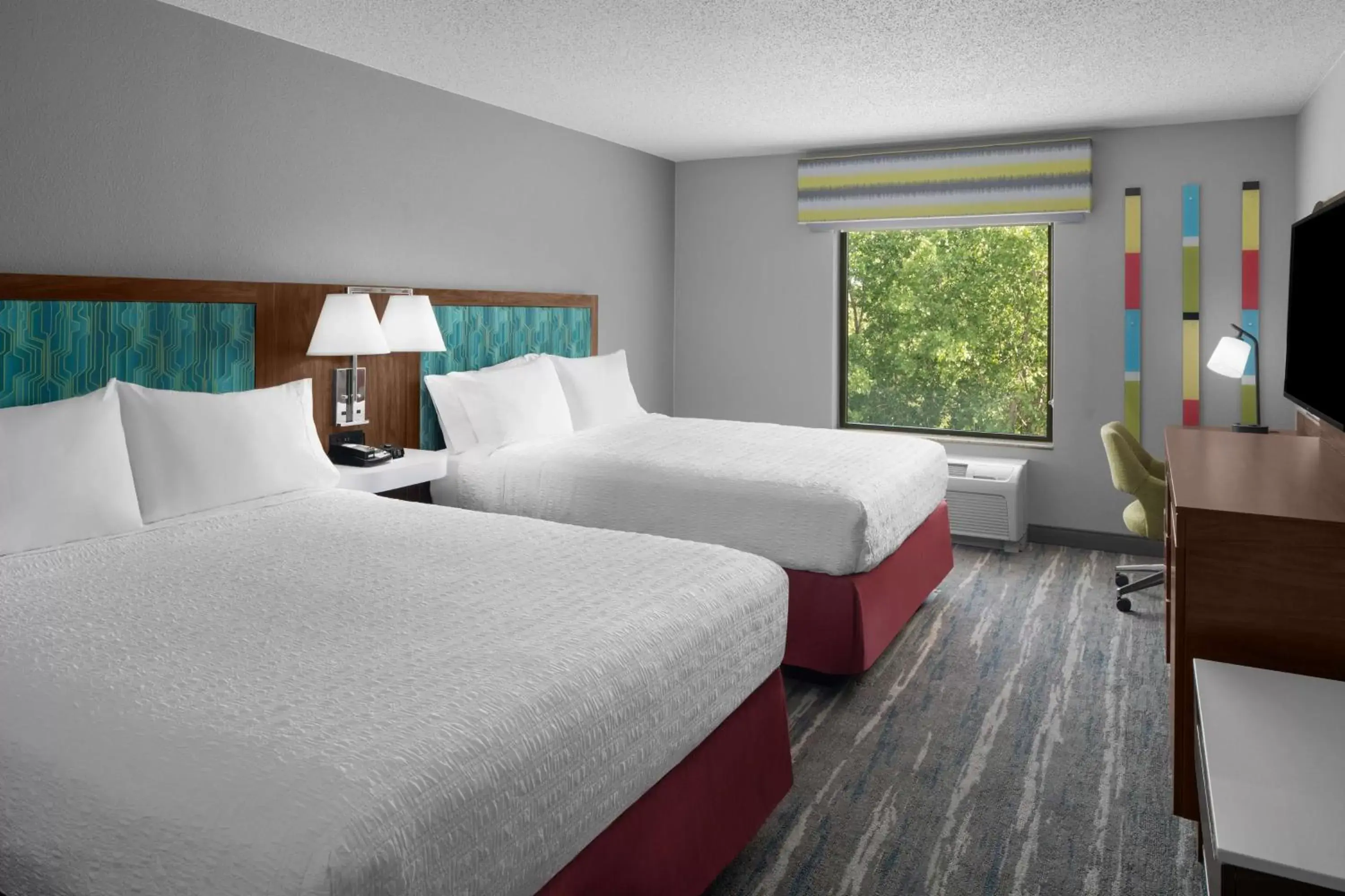 Bed in Hampton Inn & Suites Grand Rapids-Airport 28th St