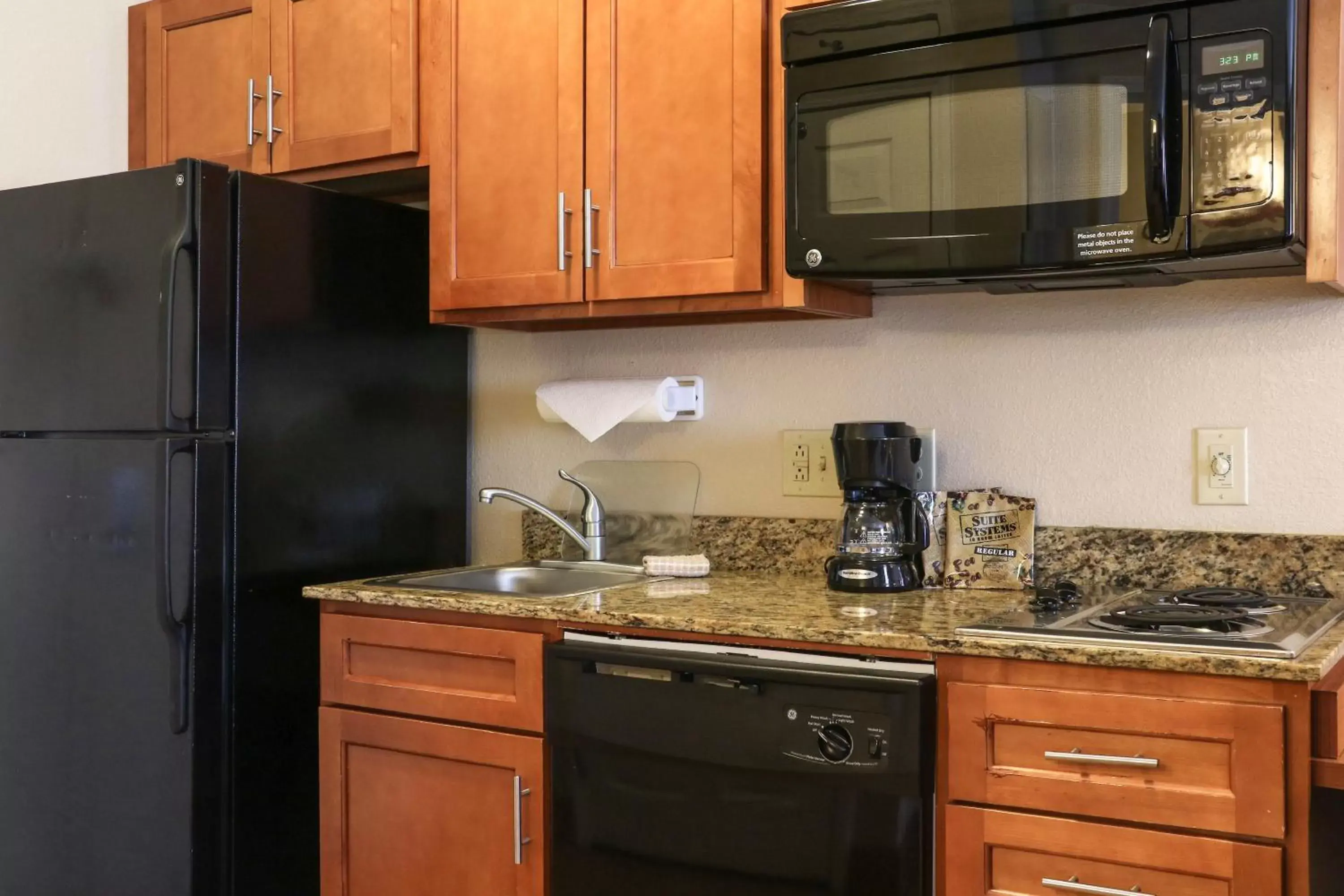 Photo of the whole room, Kitchen/Kitchenette in Candlewood Suites Slidell Northshore, an IHG Hotel