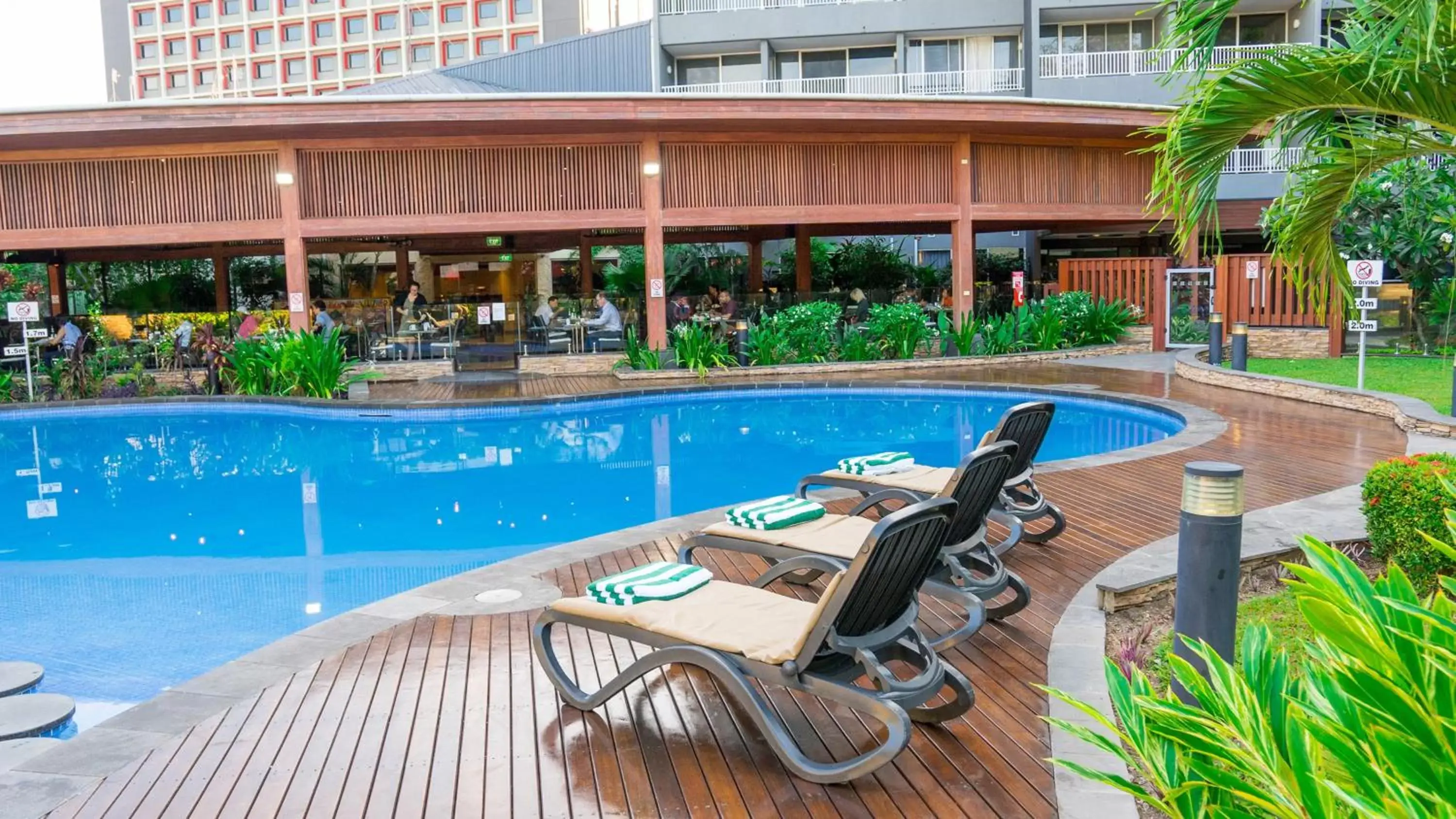 Property building, Swimming Pool in Holiday Inn & Suites Port Moresby, an IHG Hotel