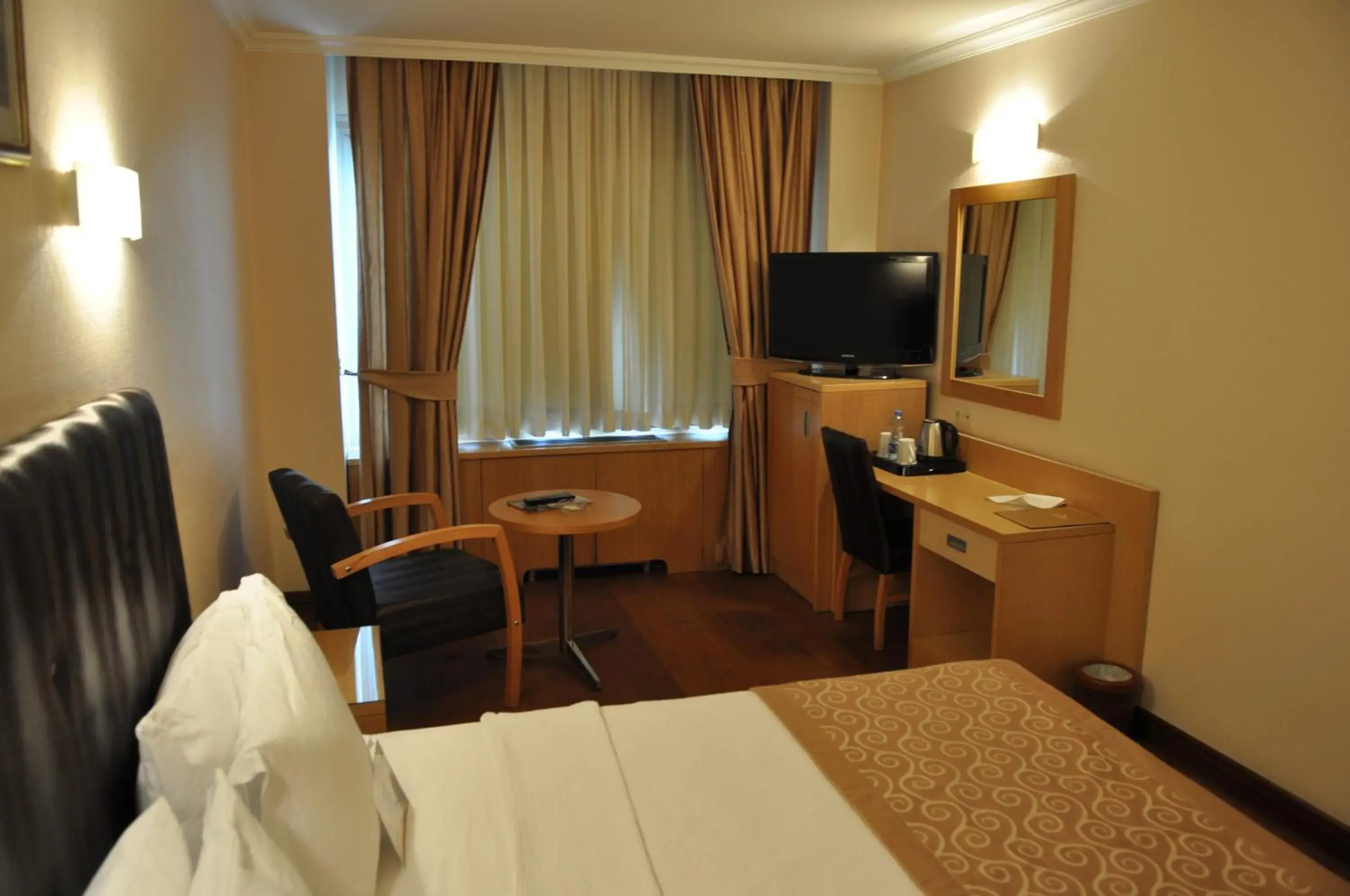 Bed in Surmeli Adana Hotel