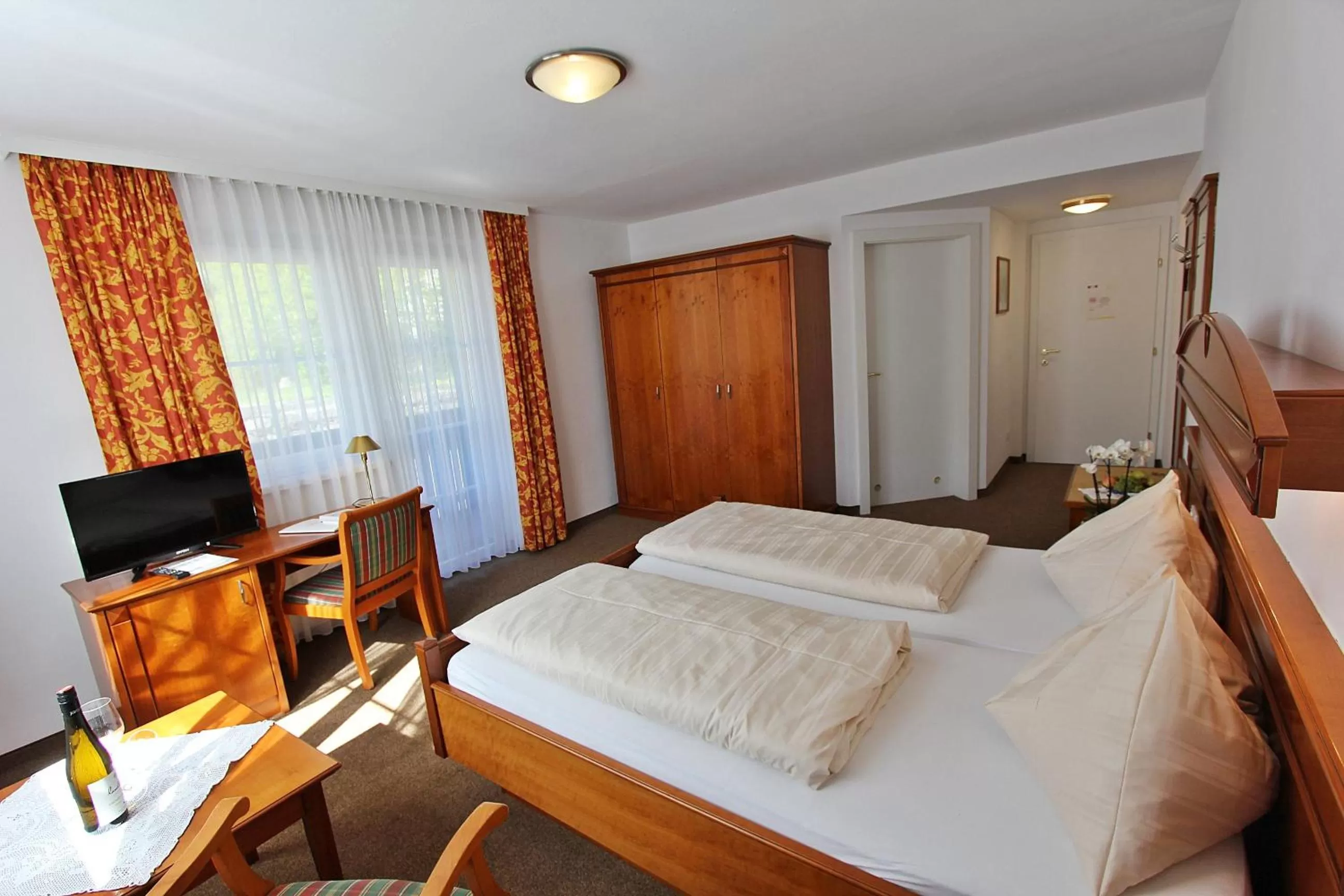 Photo of the whole room, Bed in Landhotel Post Ebensee am Traunsee ***S