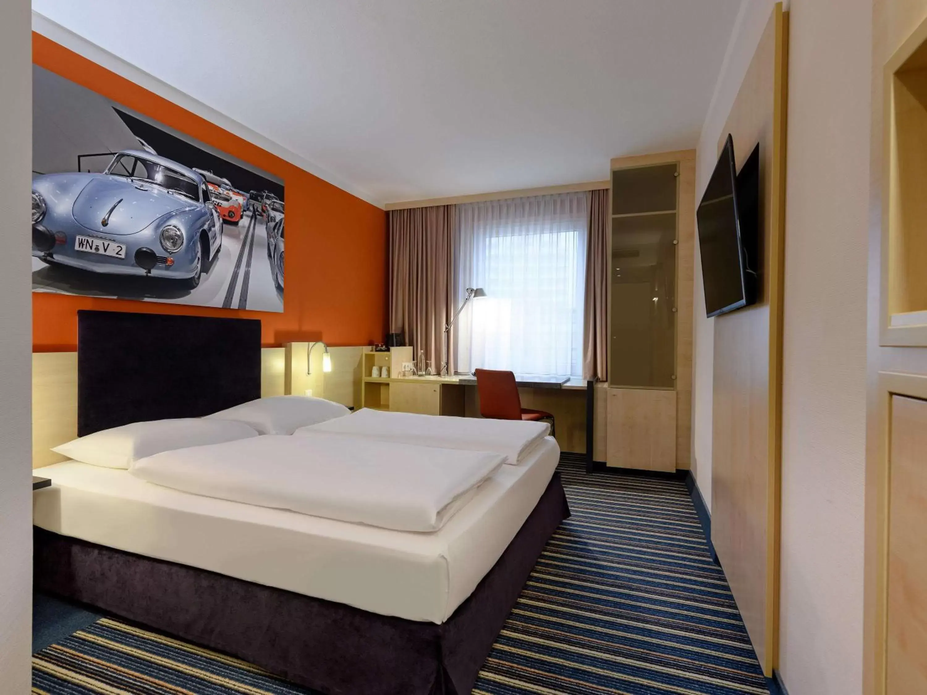 Photo of the whole room, Bed in Mercure Hotel Stuttgart City Center