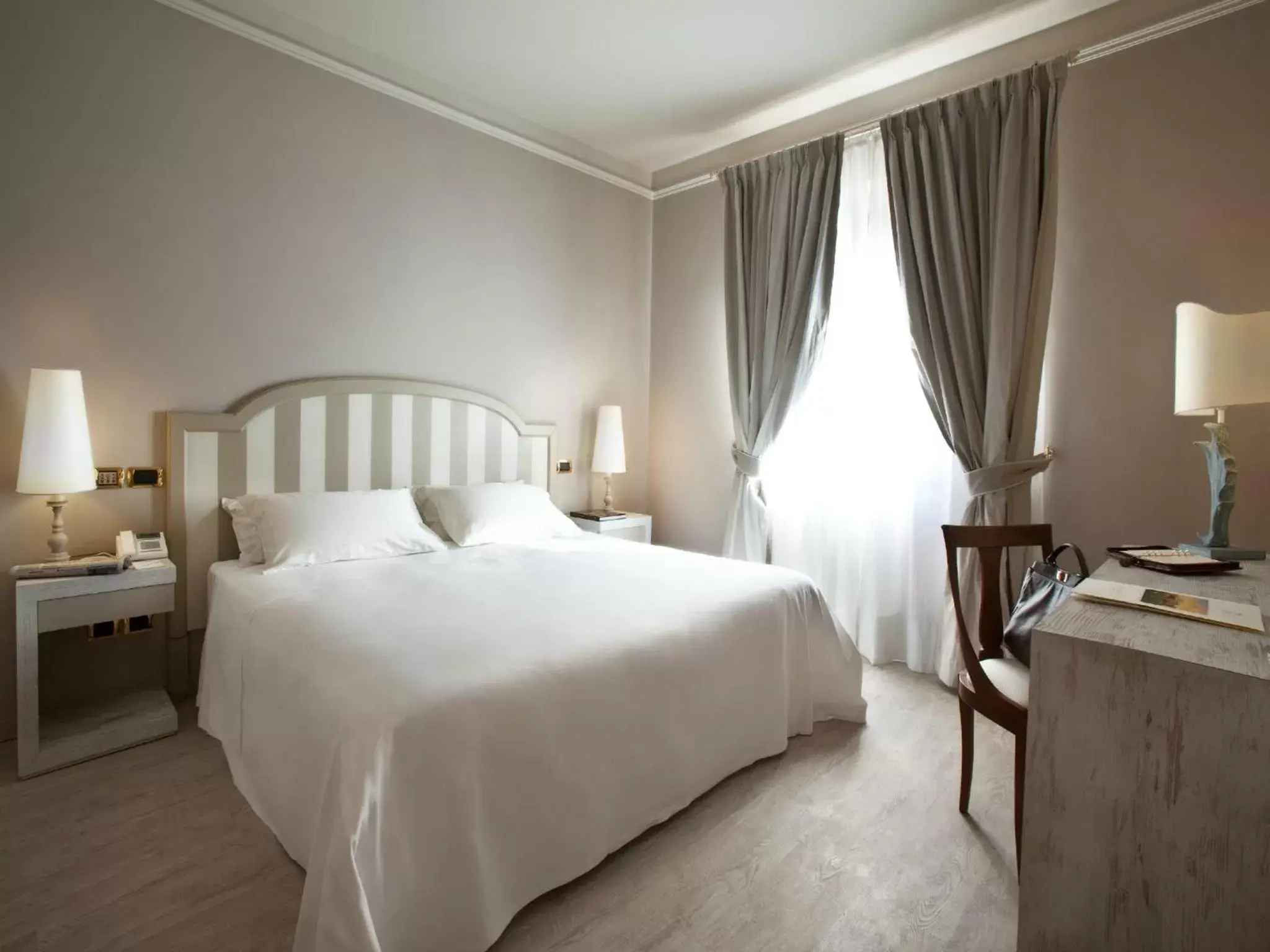 Bed in Grand Hotel Baia Verde