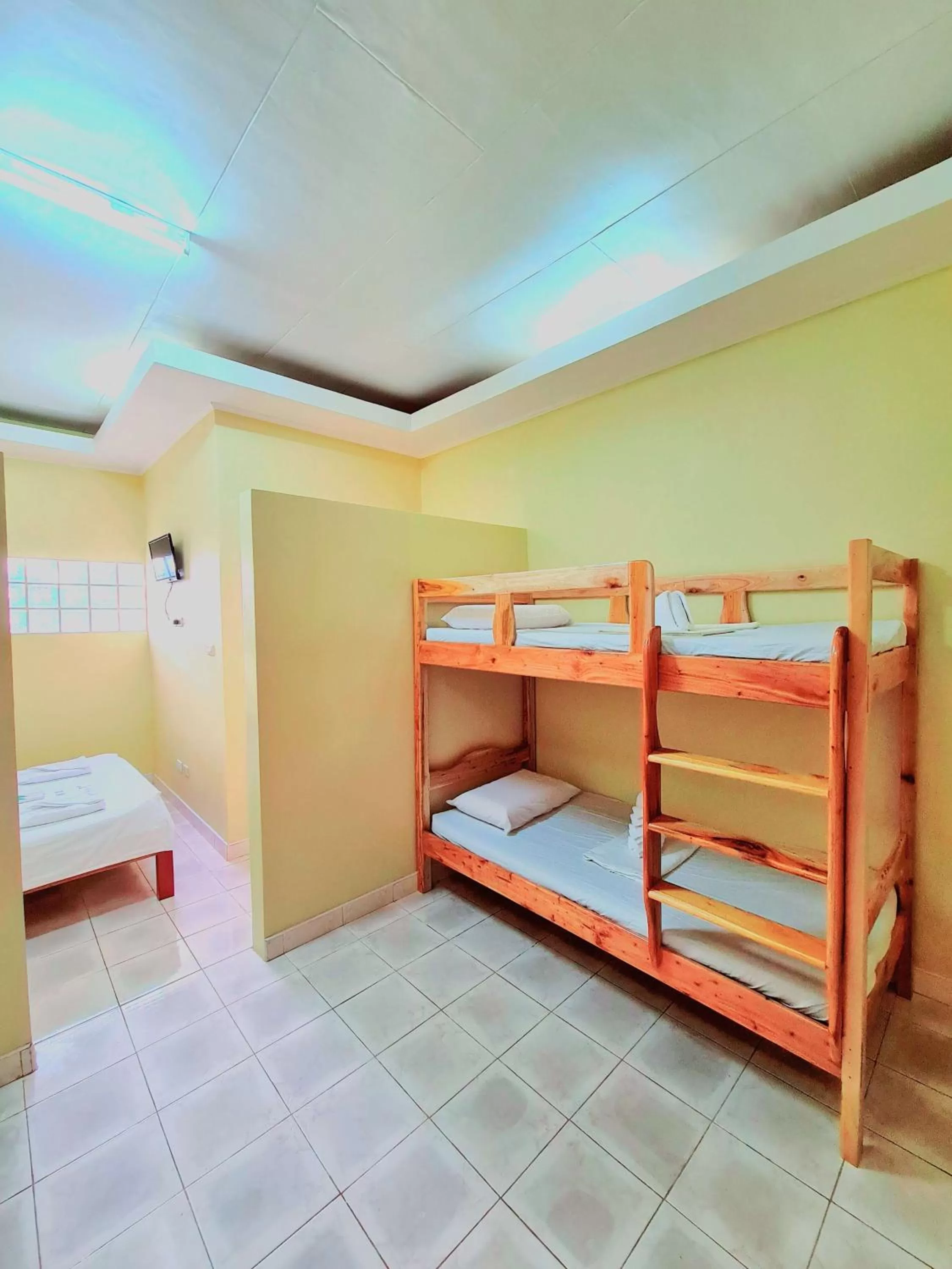 Bed in La-Familia Guest House