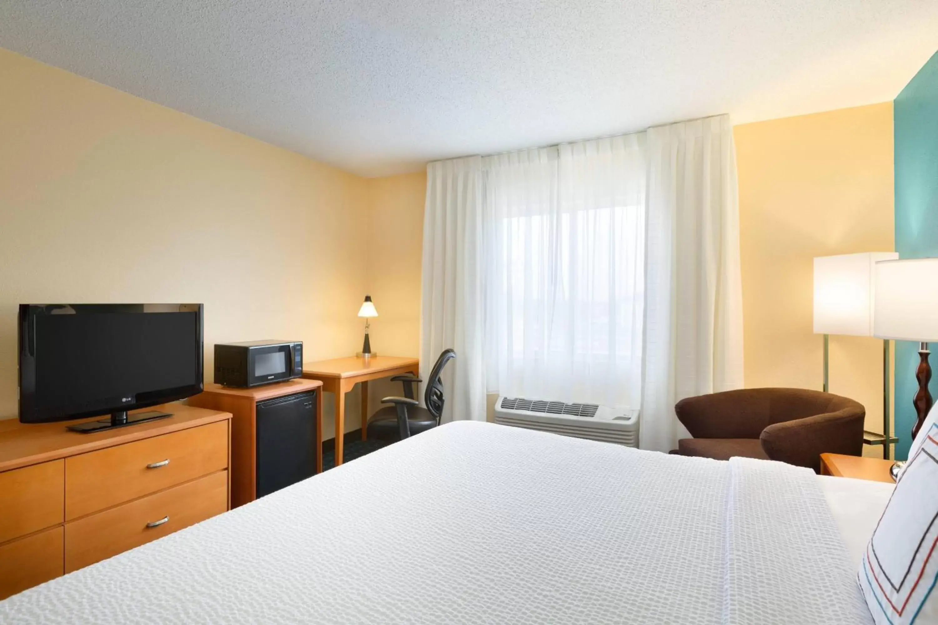 Photo of the whole room, TV/Entertainment Center in Fairfield Inn & Suites Bismarck South