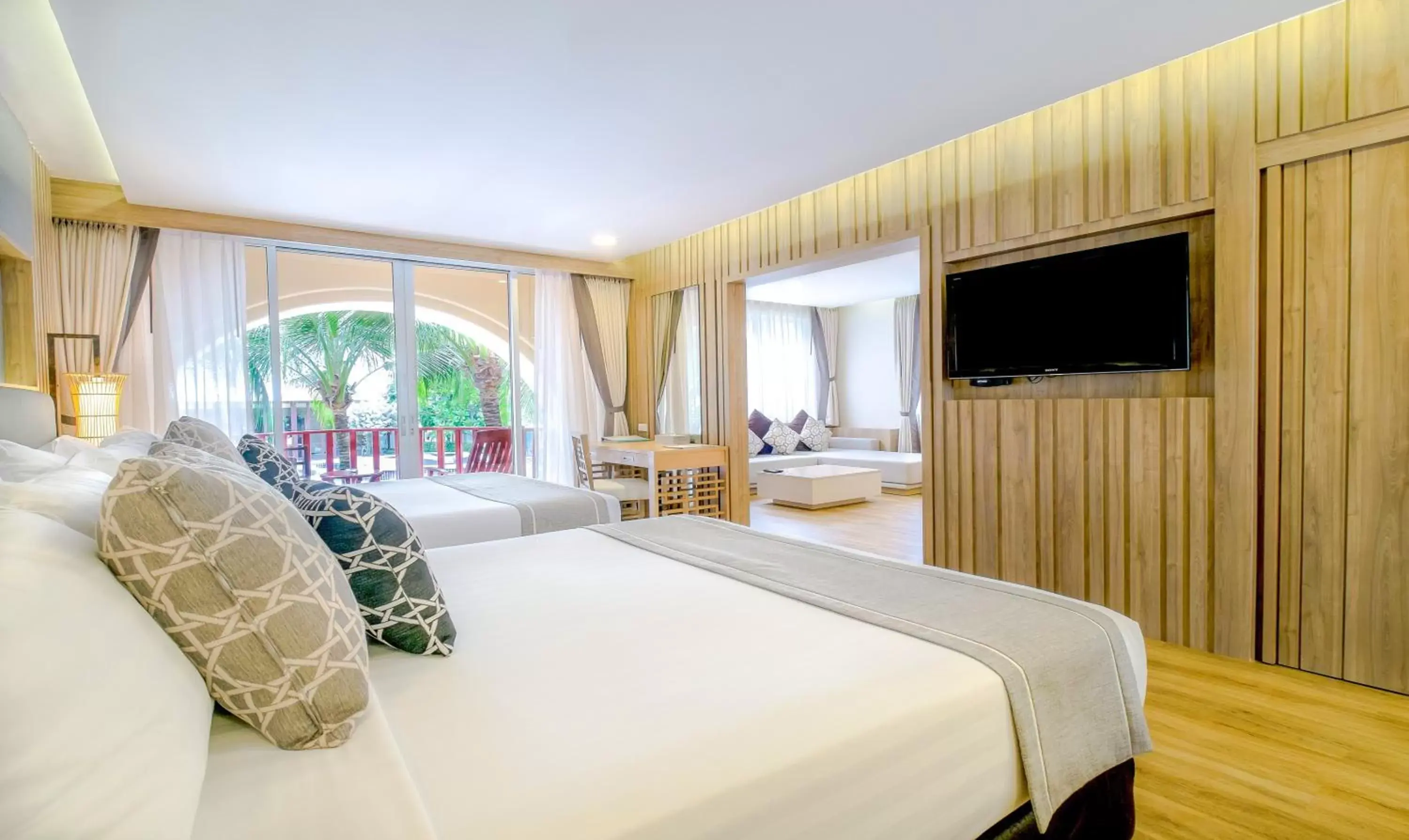 Bedroom in Phuket Graceland Resort and Spa - SHA Extra Plus