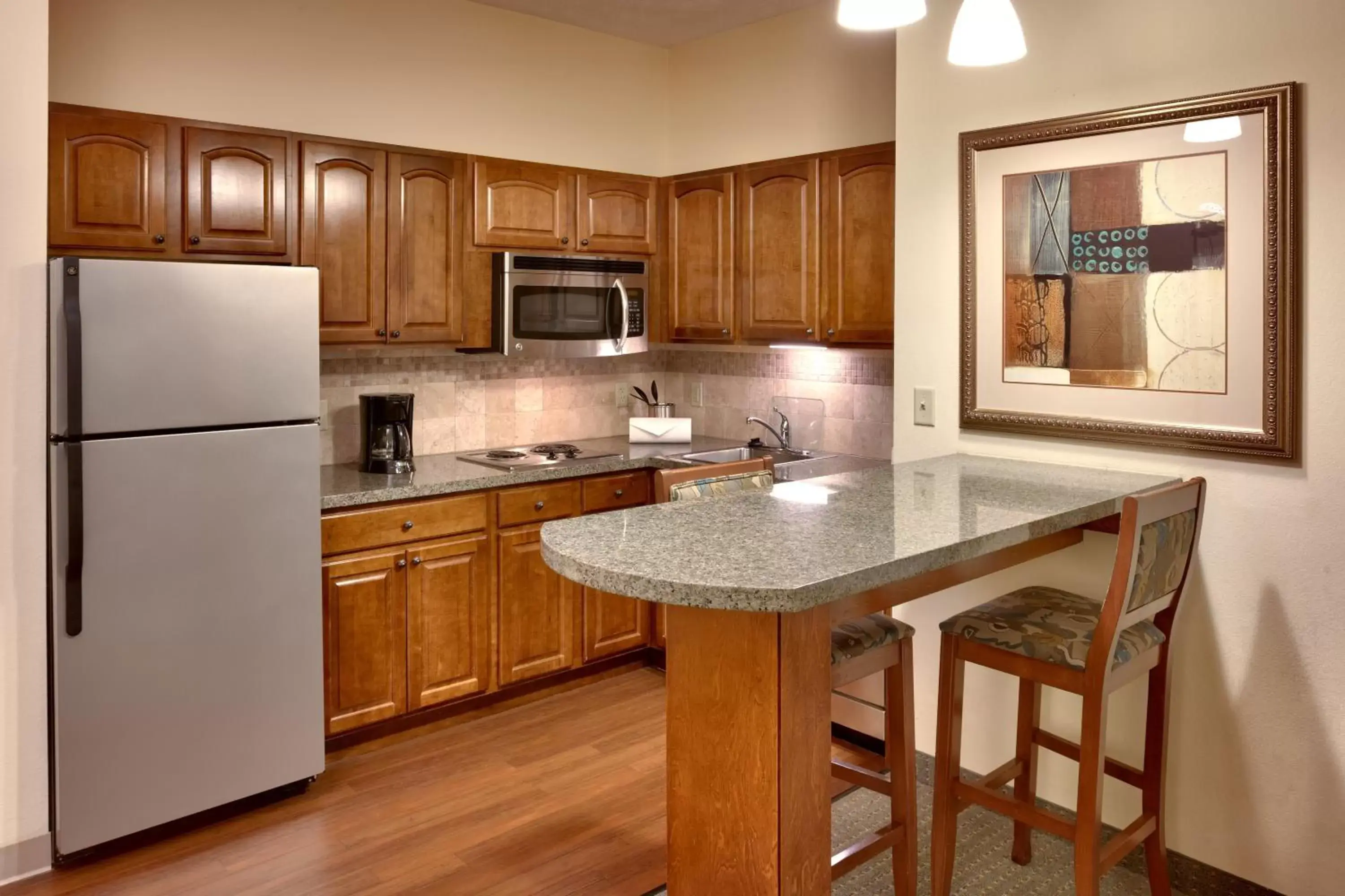 Photo of the whole room, Kitchen/Kitchenette in Staybridge Suites Omaha 80th and Dodge, an IHG Hotel