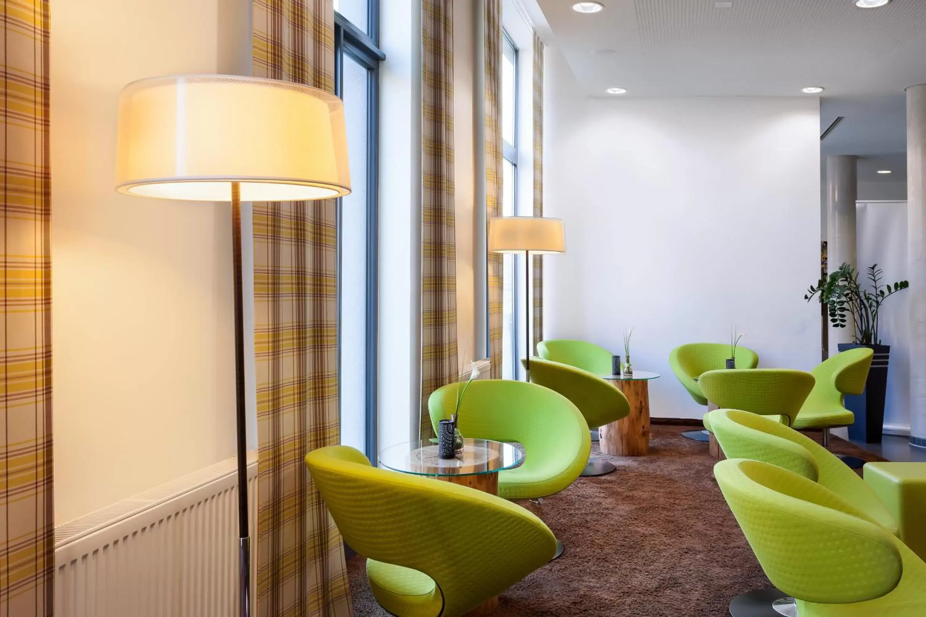 Lounge or bar in Holiday Inn Express Augsburg, an IHG Hotel