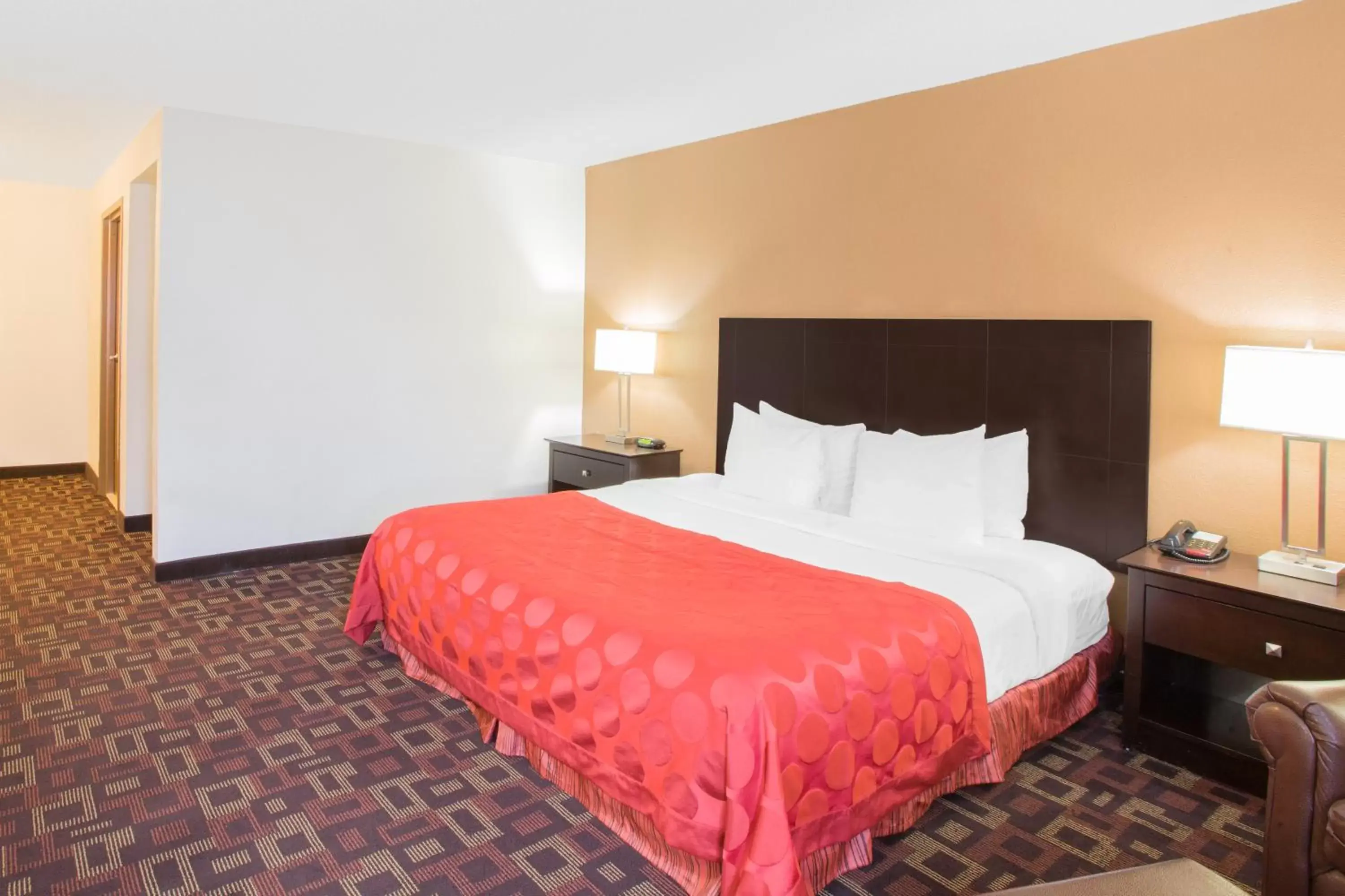 Bed in Ramada by Wyndham Tulsa