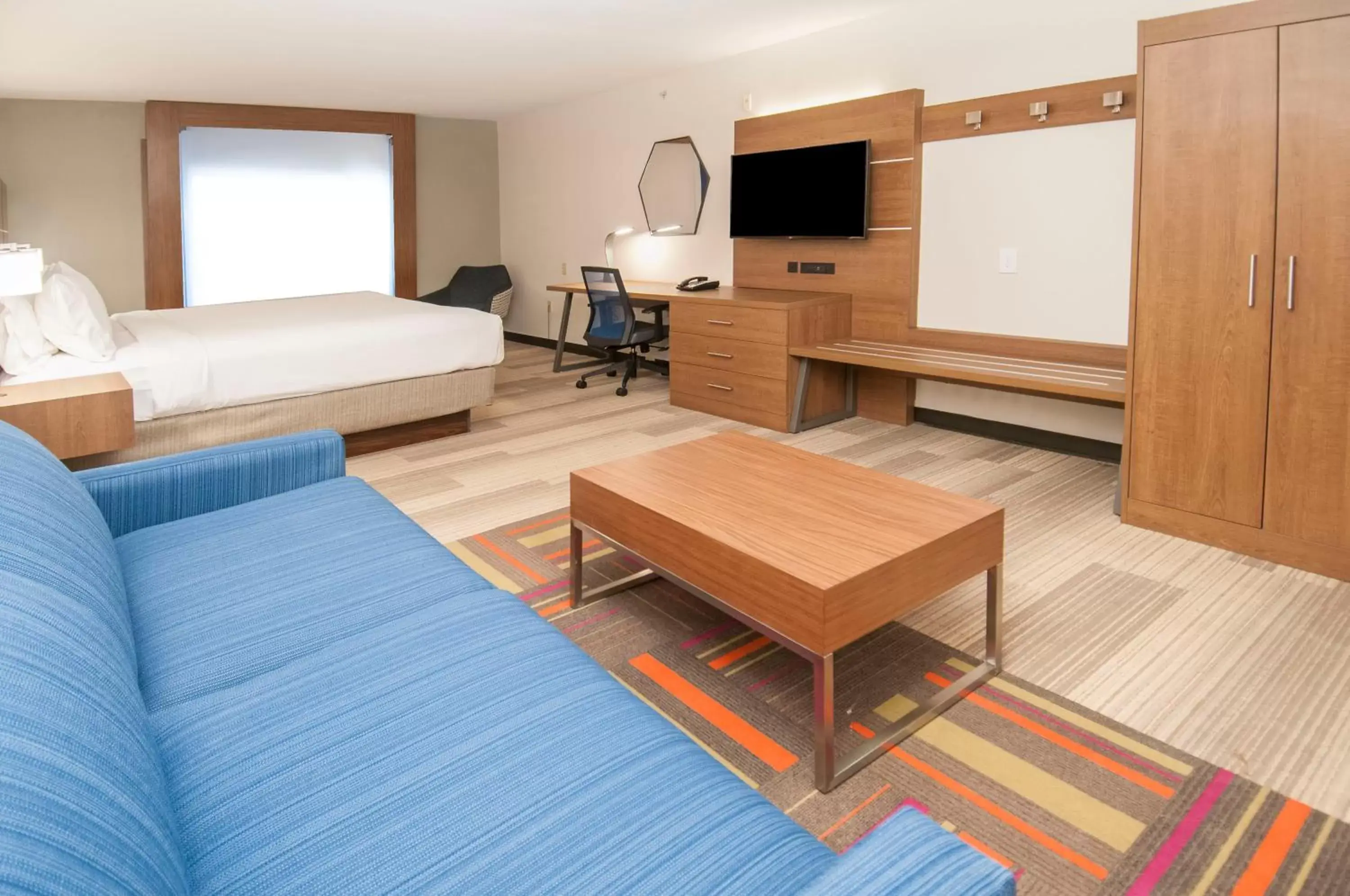 Photo of the whole room, TV/Entertainment Center in Holiday Inn Express Hotel & Suites Dallas-North Tollway/North Plano, an IHG Hotel