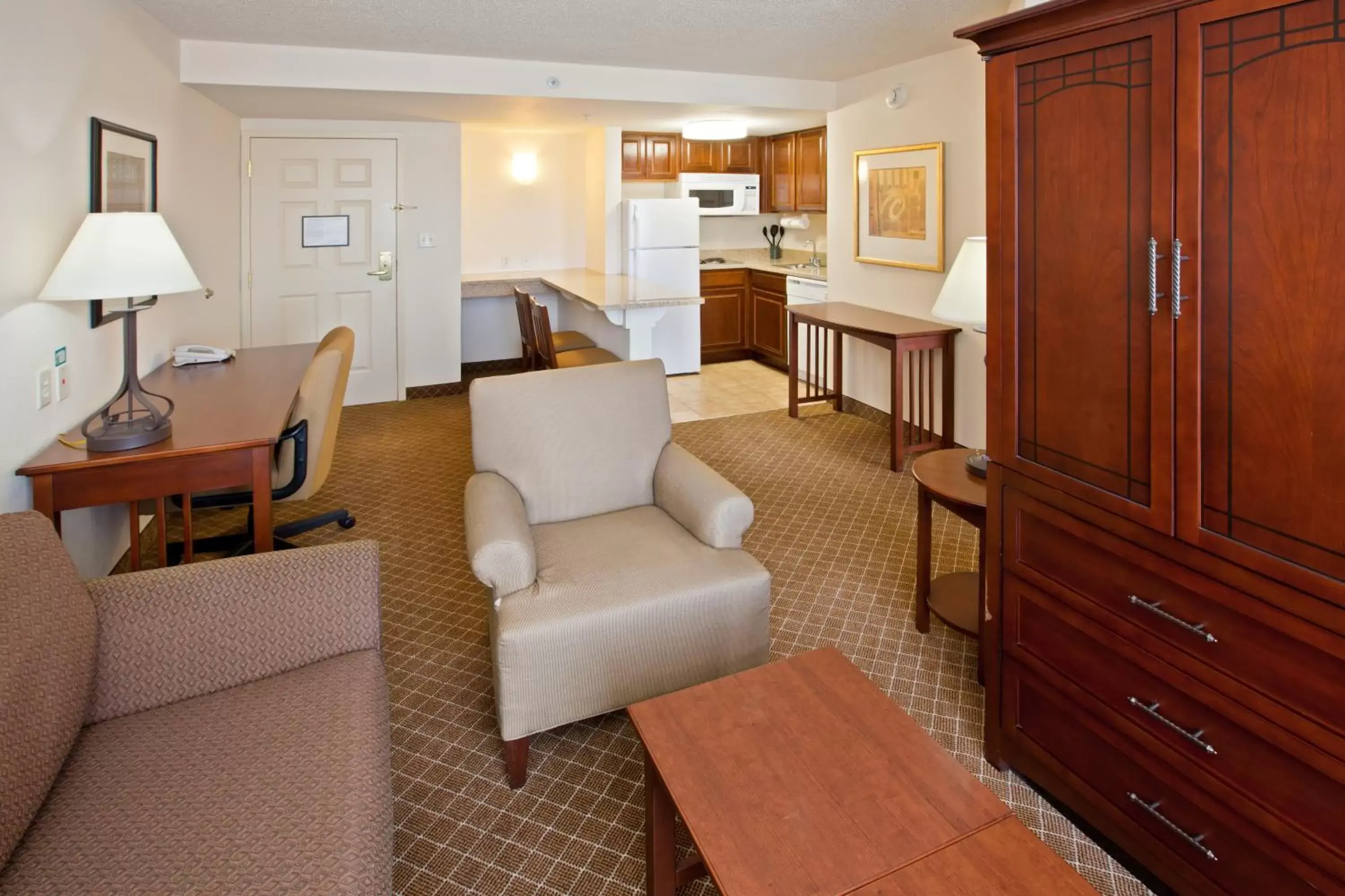 Living room, Seating Area in Staybridge Suites Indianapolis-Airport, an IHG Hotel