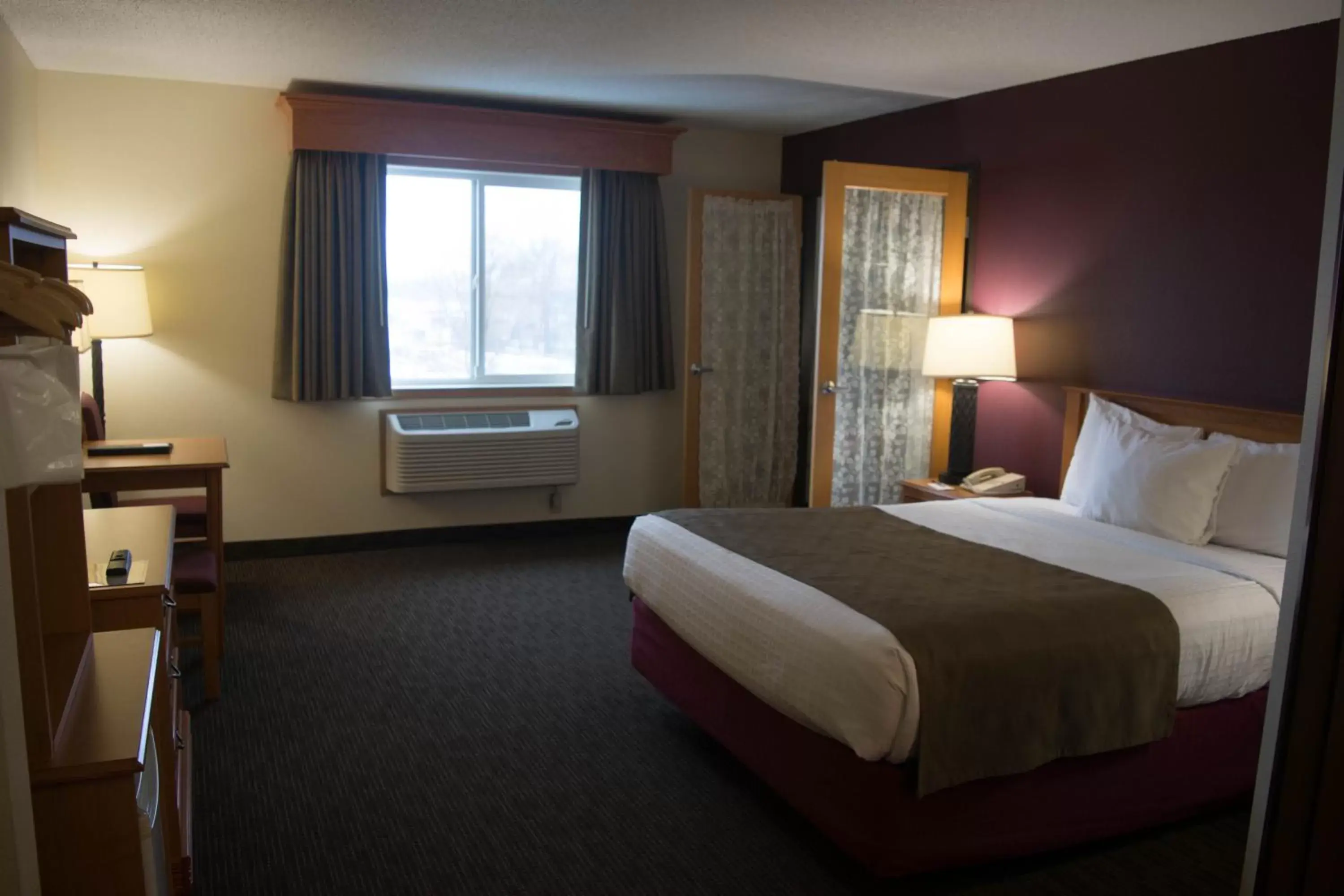 Bed in AmericInn by Wyndham Madison SD Bed in AmericInn by Wyndham Madison SD