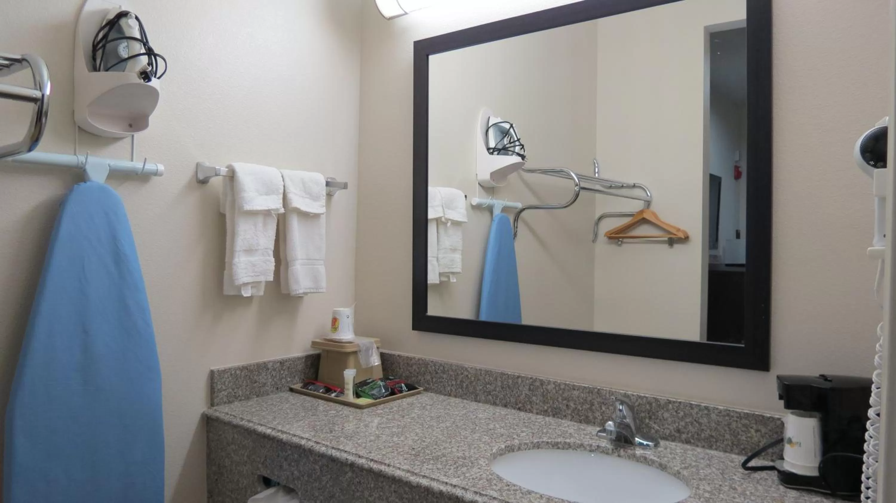 Bathroom in Super 8 by Wyndham Houston North I-45