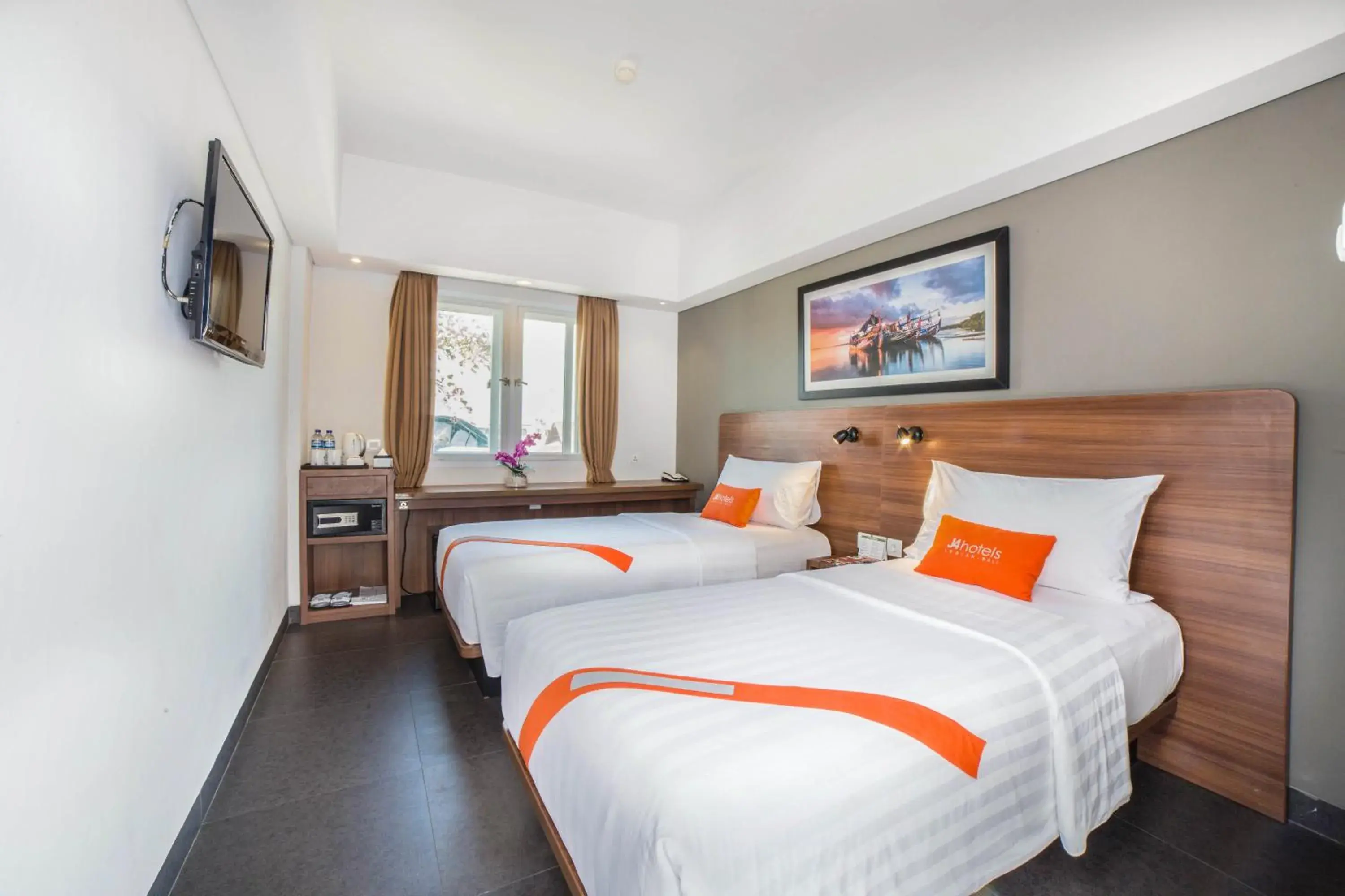 Bed in J4 Hotels Legian