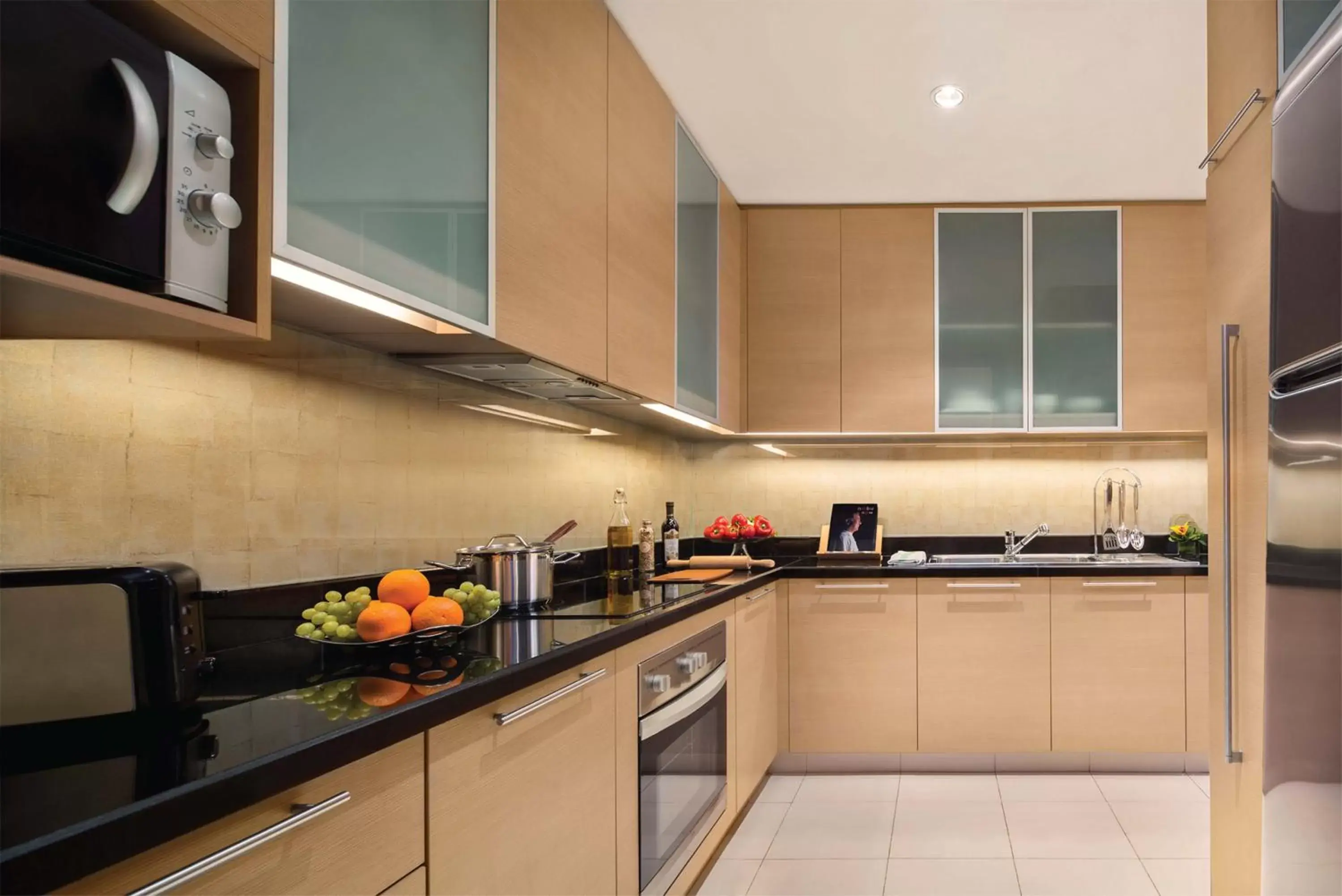 Kitchen or kitchenette, Kitchen/Kitchenette in Oakwood Premier Cozmo Jakarta