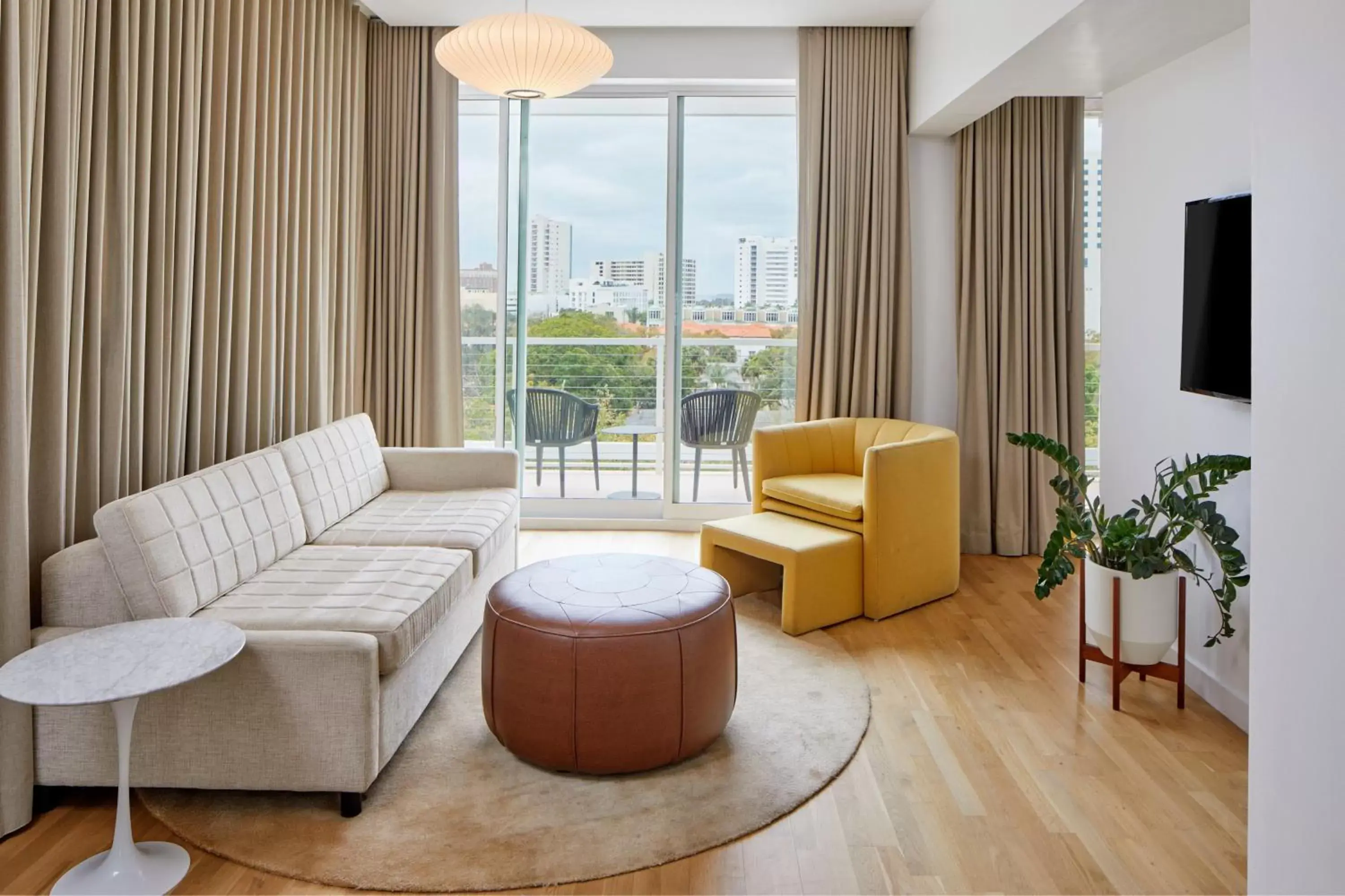 Living room, Seating Area in The Sarasota Modern, a Tribute Portfolio Hotel