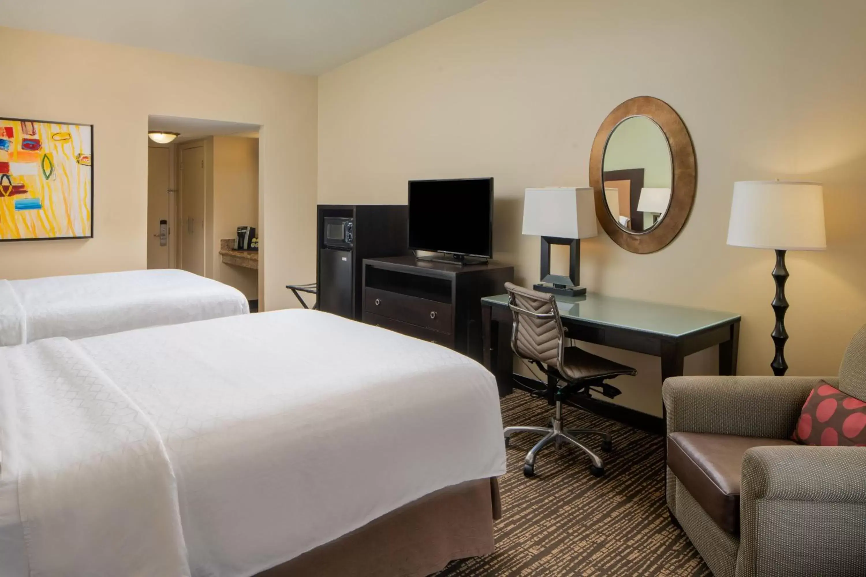 Photo of the whole room, TV/Entertainment Center in Holiday Inn Resort Galveston - On The Beach, an IHG Hotel