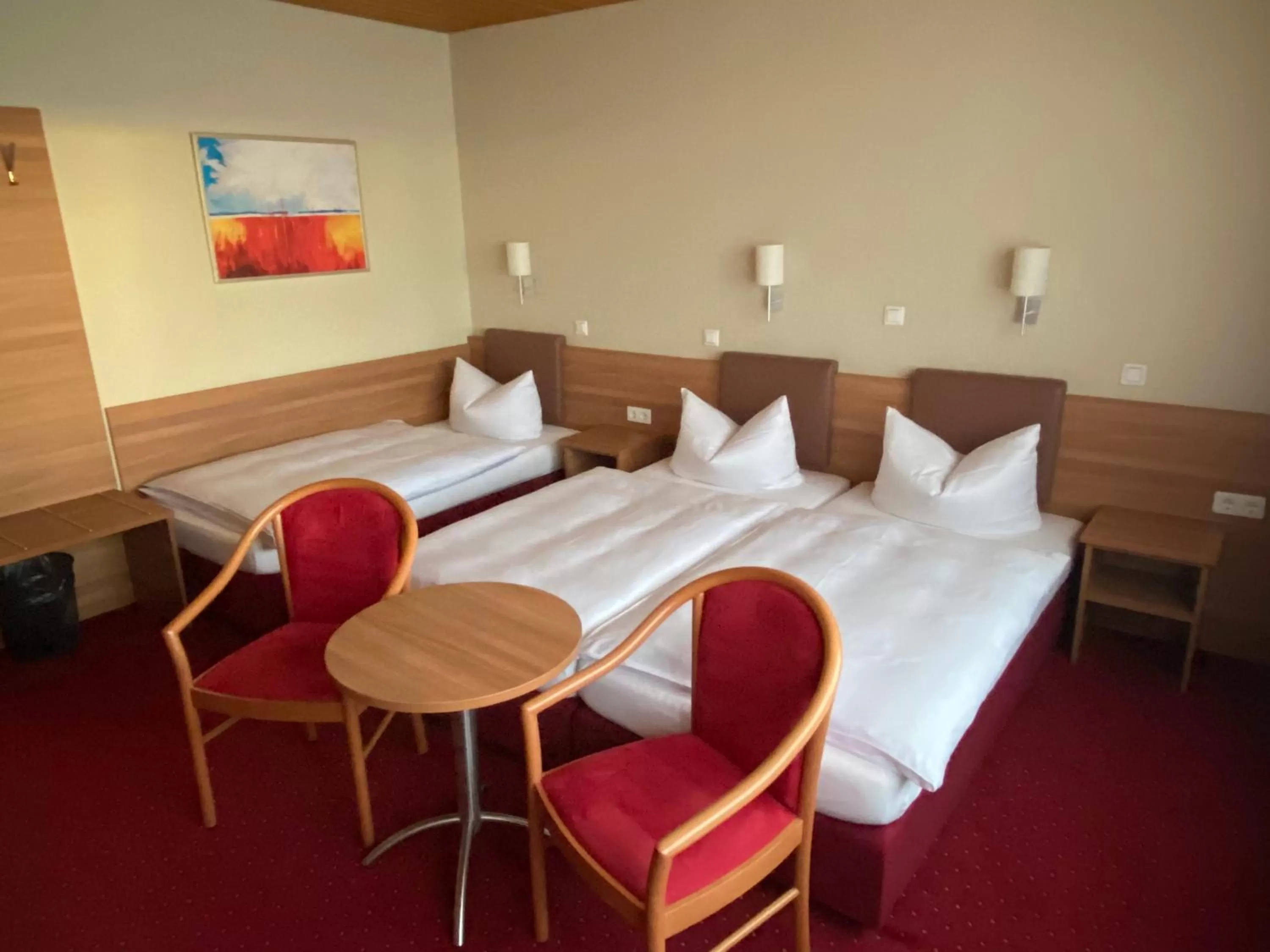 Bed in Nürnberger Trichter Family-Business Hotel Garni