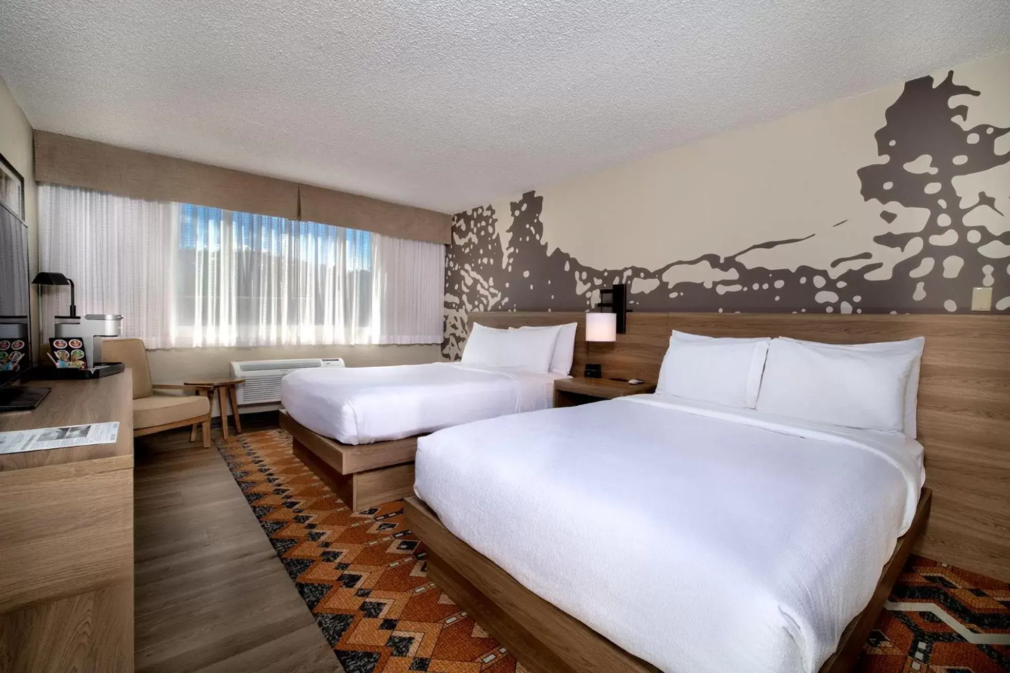 Bed in The Ridgeline Hotel, Estes Park, Ascend Hotel Collection