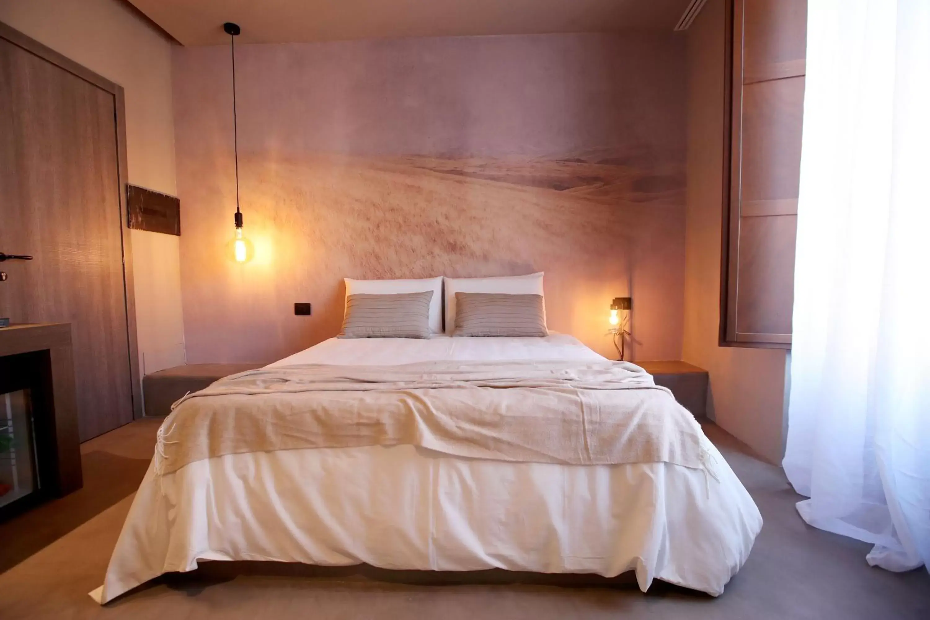 Bed in Casa Nostra Luxury Suites