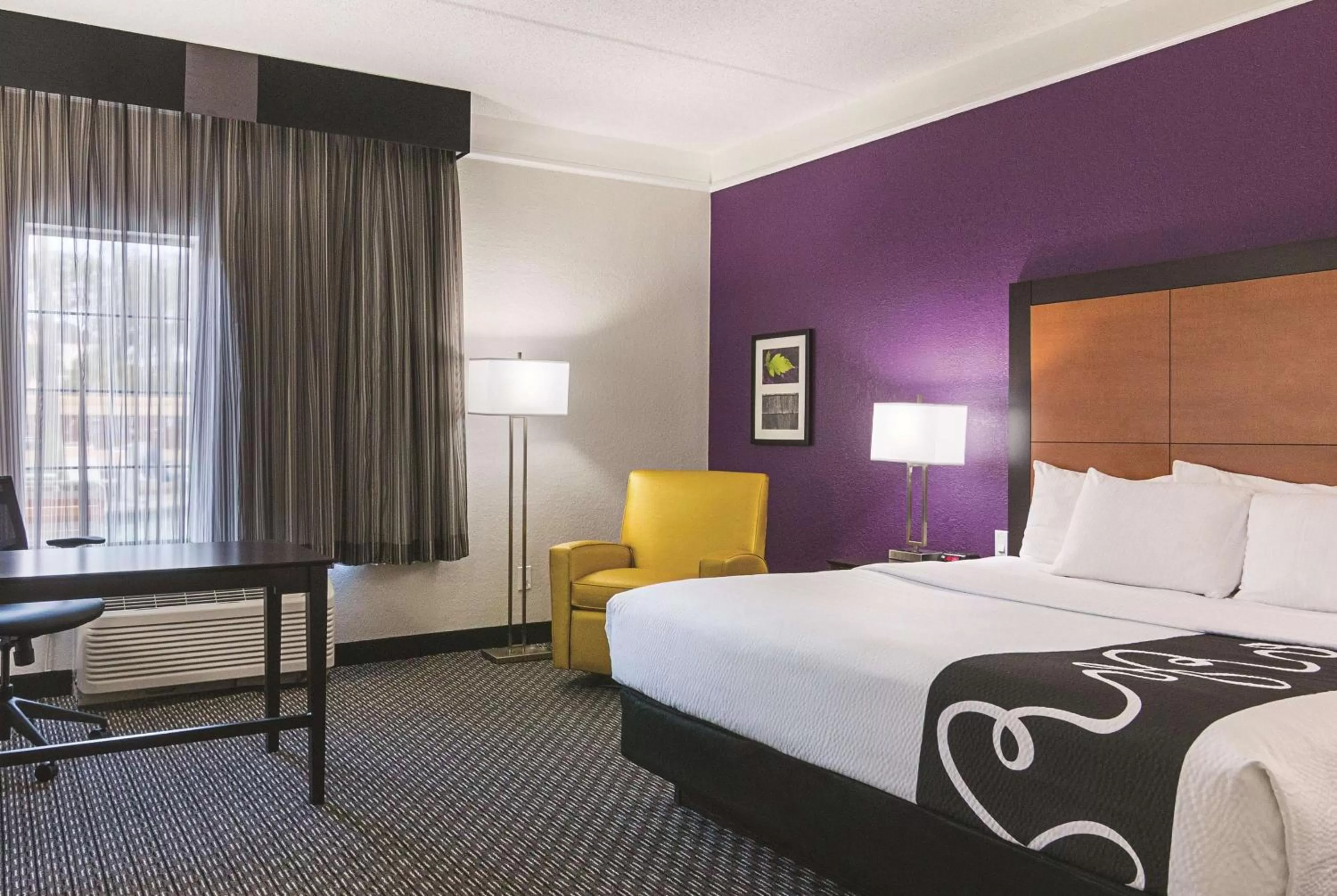 Photo of the whole room, Bed in La Quinta by Wyndham Orlando Airport North - Free Airport Shuttle!