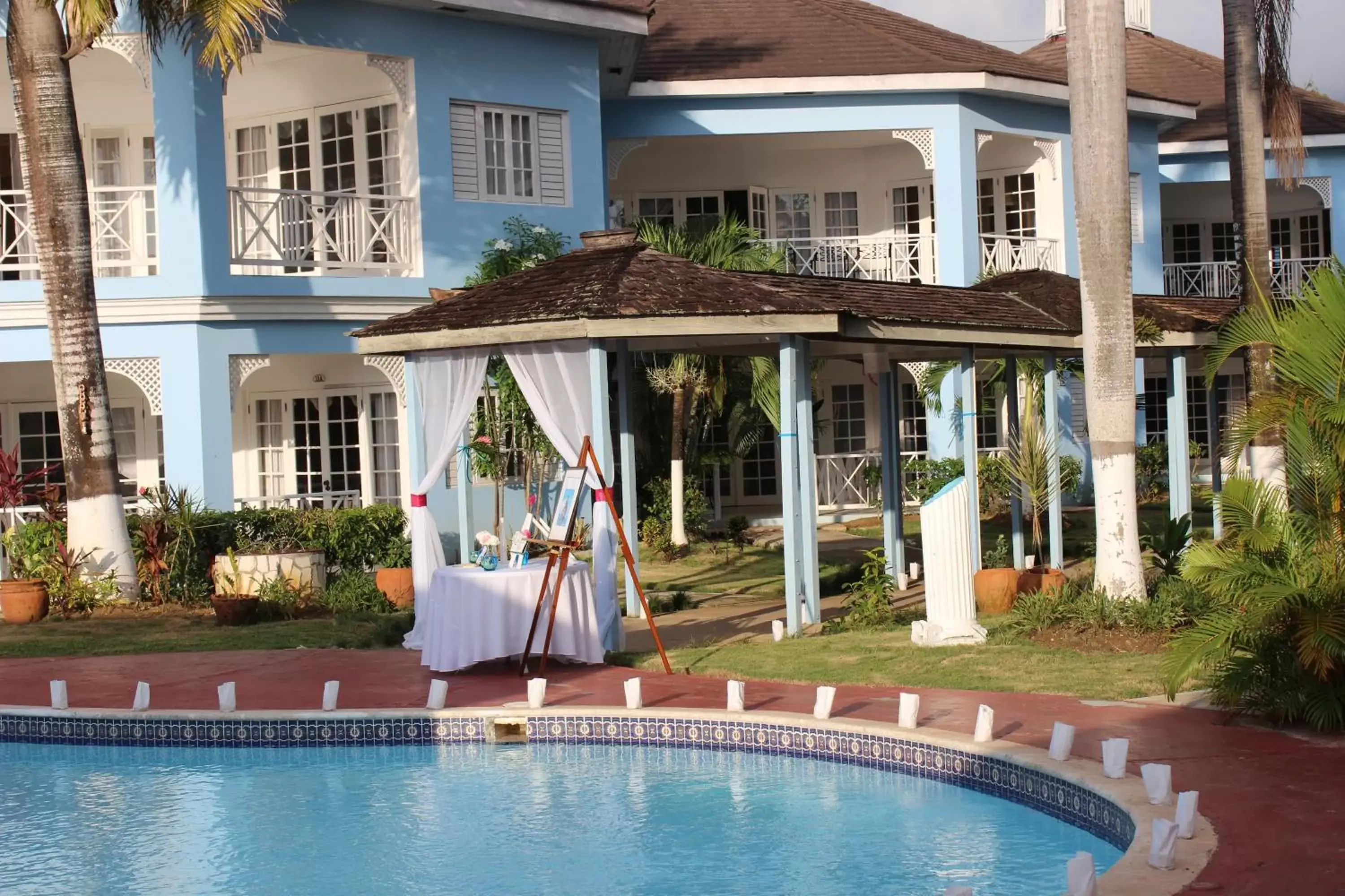 Swimming pool, Property Building in Beachcomber Club Resort