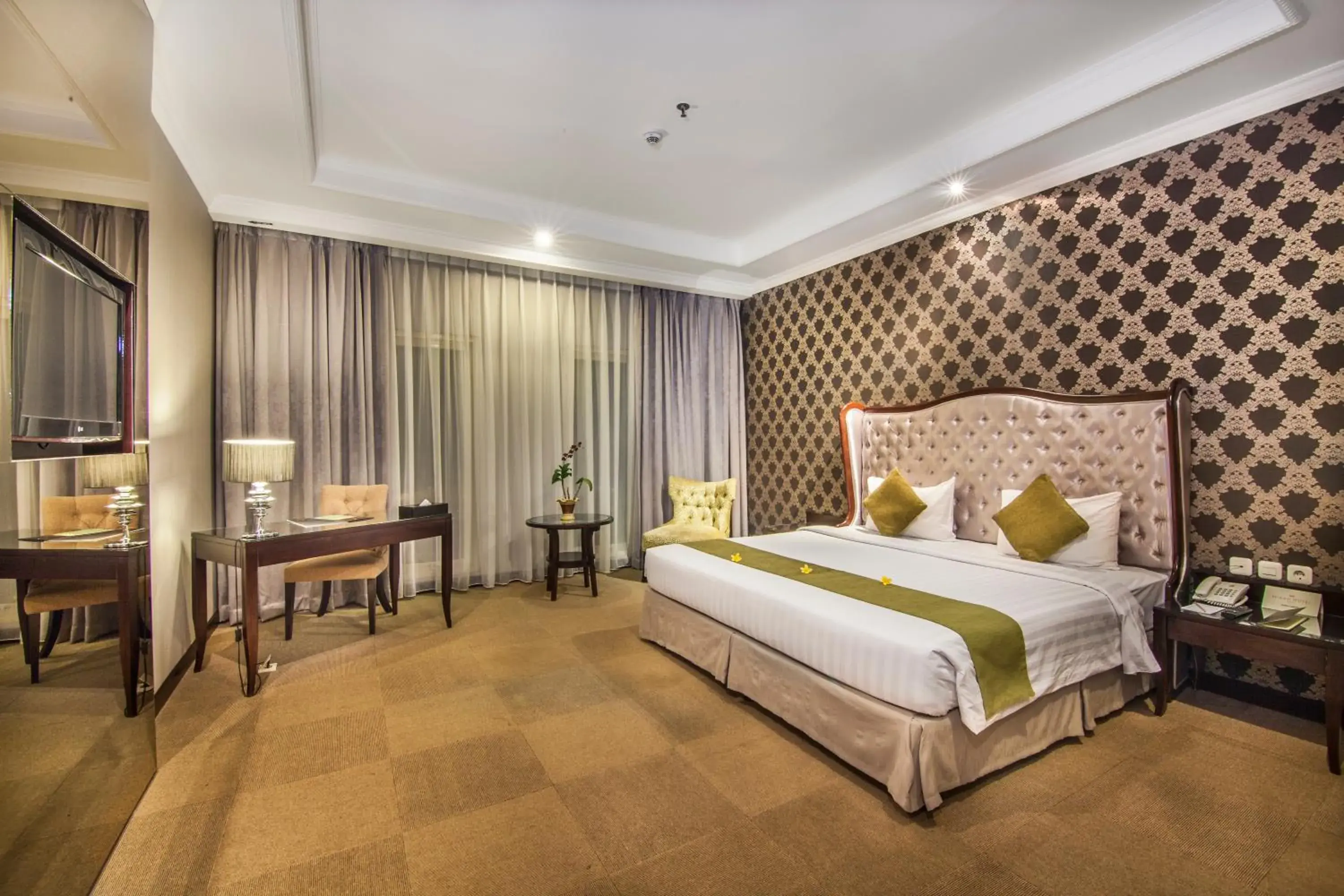 Photo of the whole room, Bed in The Mirah Bogor Hotel