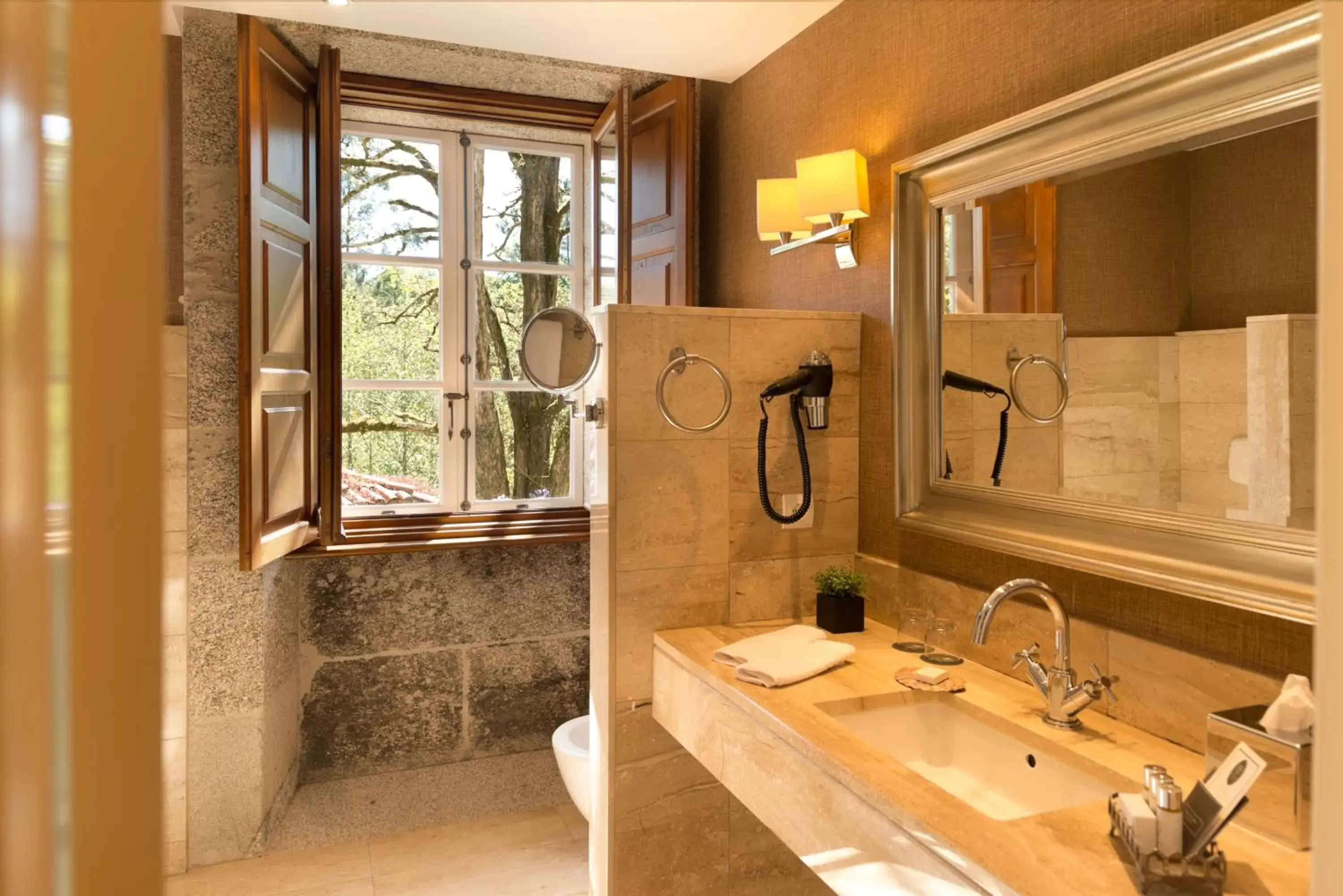 Bathroom in A Quinta Da Auga Hotel Spa Relais & Chateaux Bathroom in A Quinta Da Auga Hotel Spa Relais & Chateaux