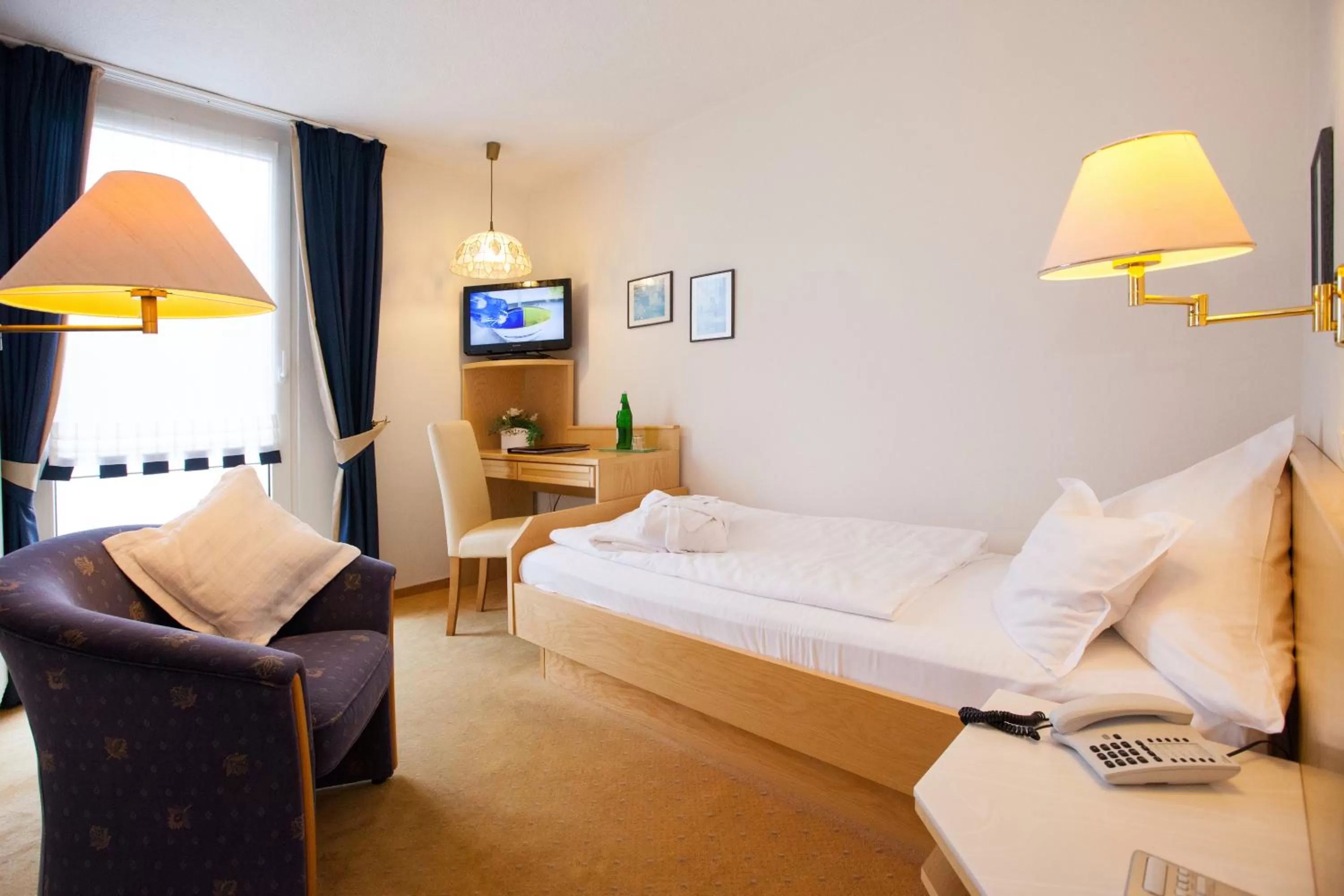 Photo of the whole room, Bed in Ferienhotel Haus Becker