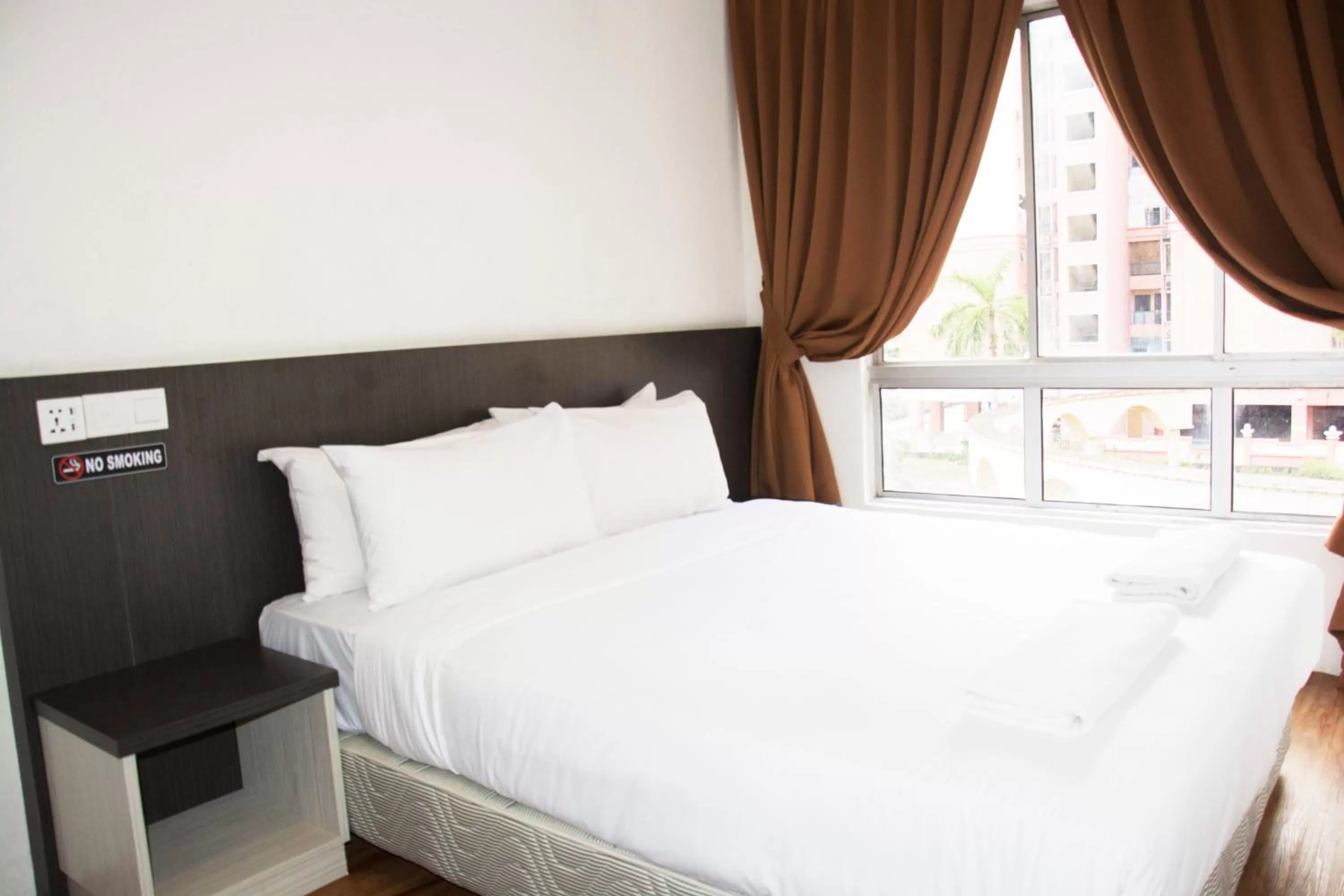 Bed in Promenade Service Apartment