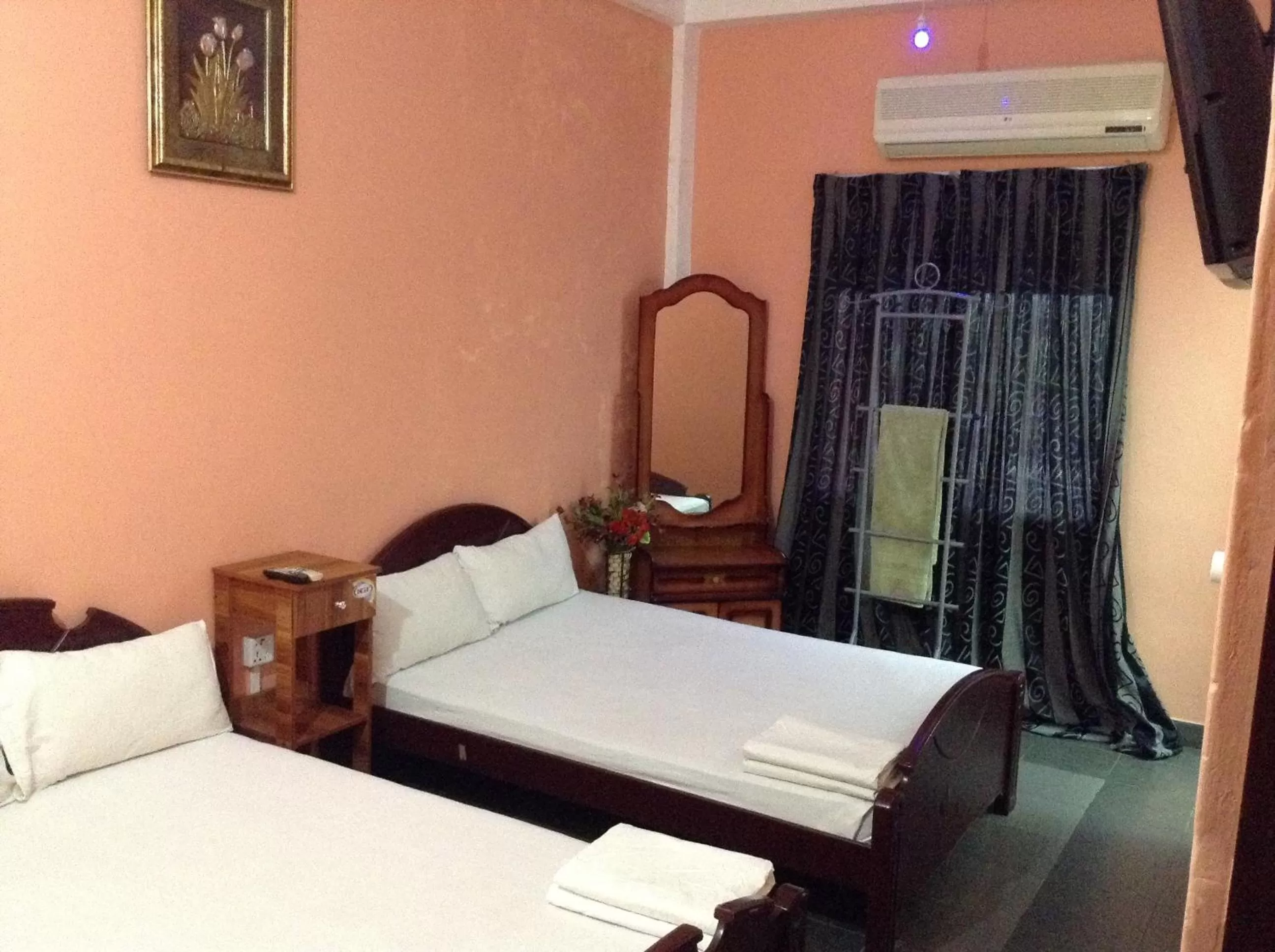 Bed in Sunshine Hotel