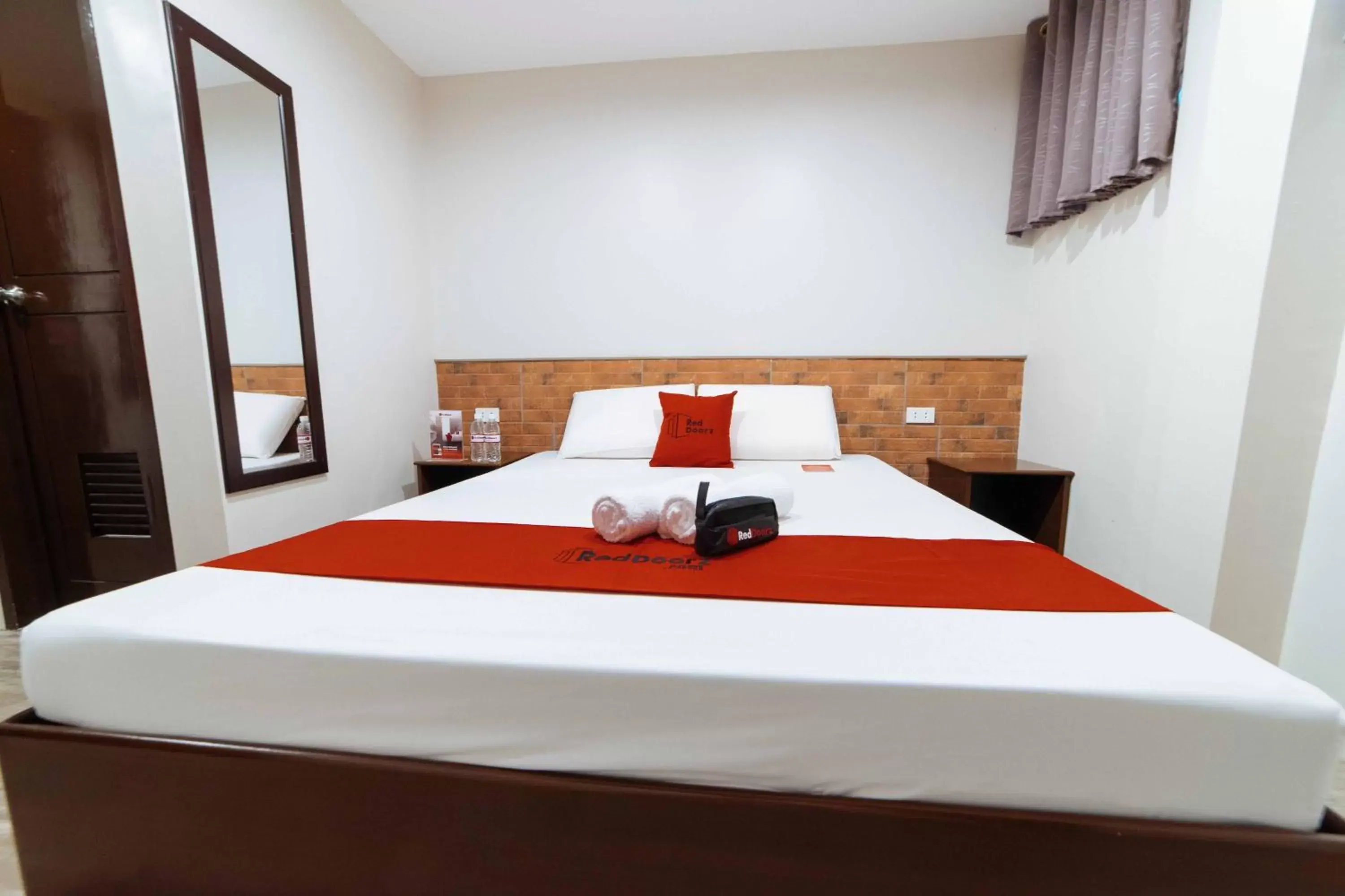 Bed in RedDoorz at Traveler's Inn Bajada Davao