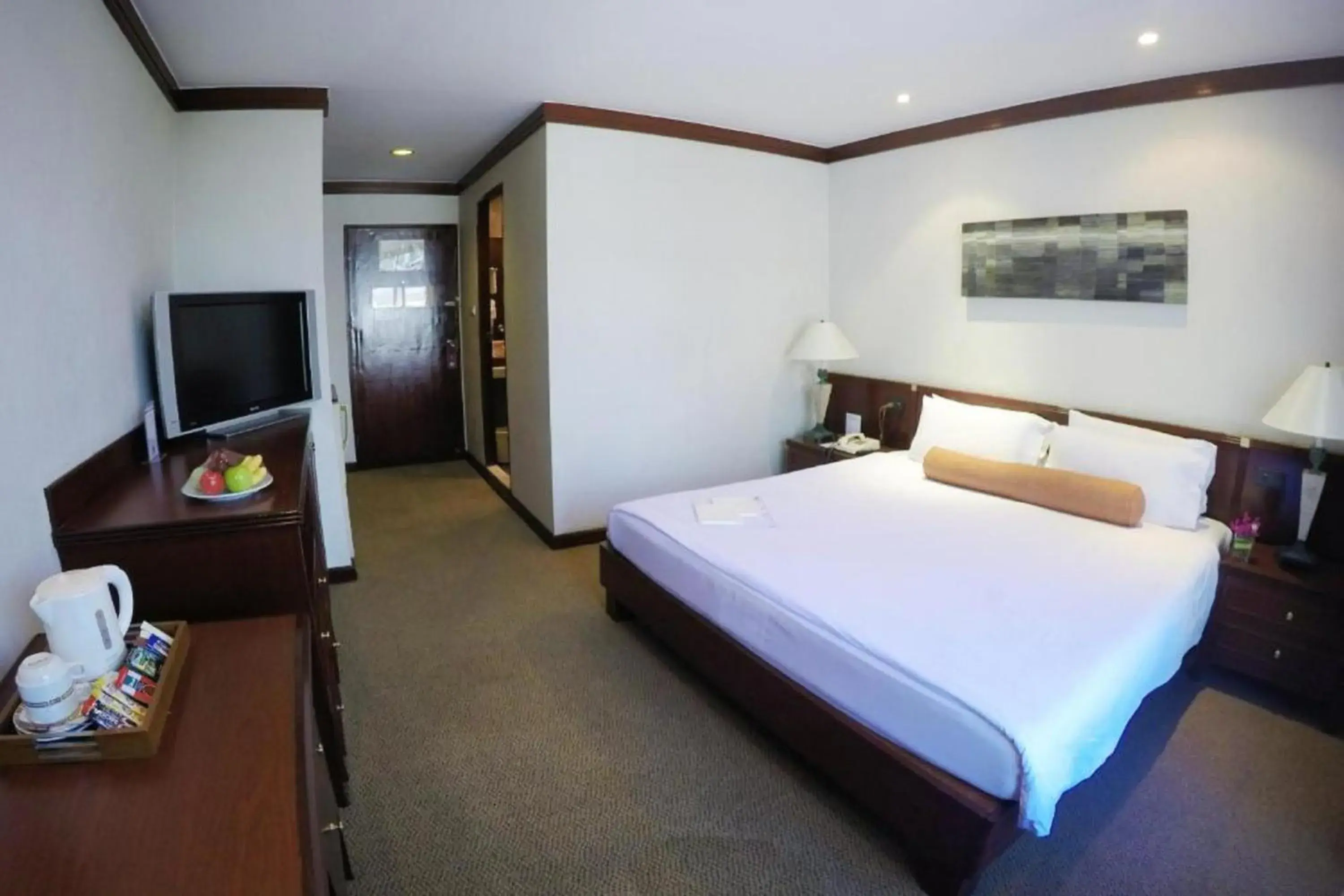 Bed in City Lodge Bangkok