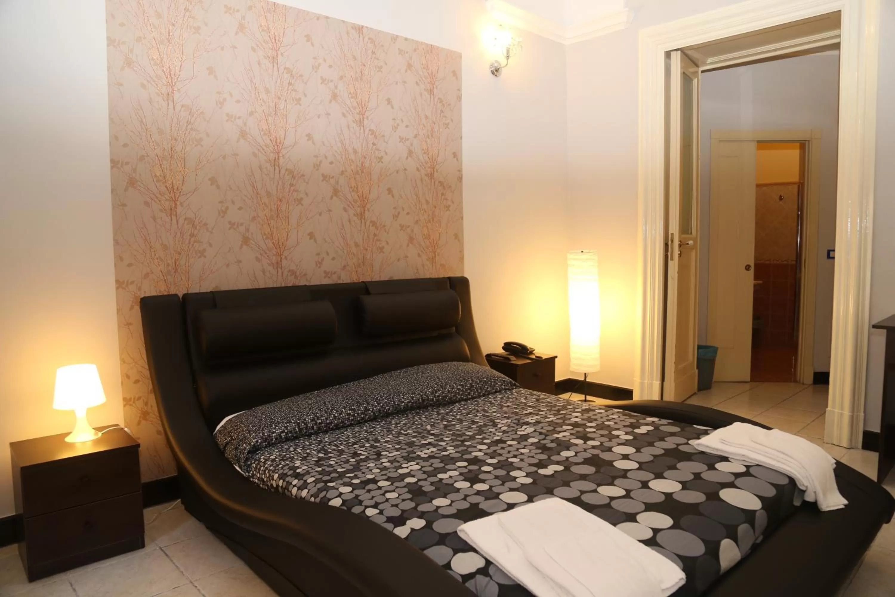 Photo of the whole room, Bed in Hotel Sangiuliano 132 centro storico Catania