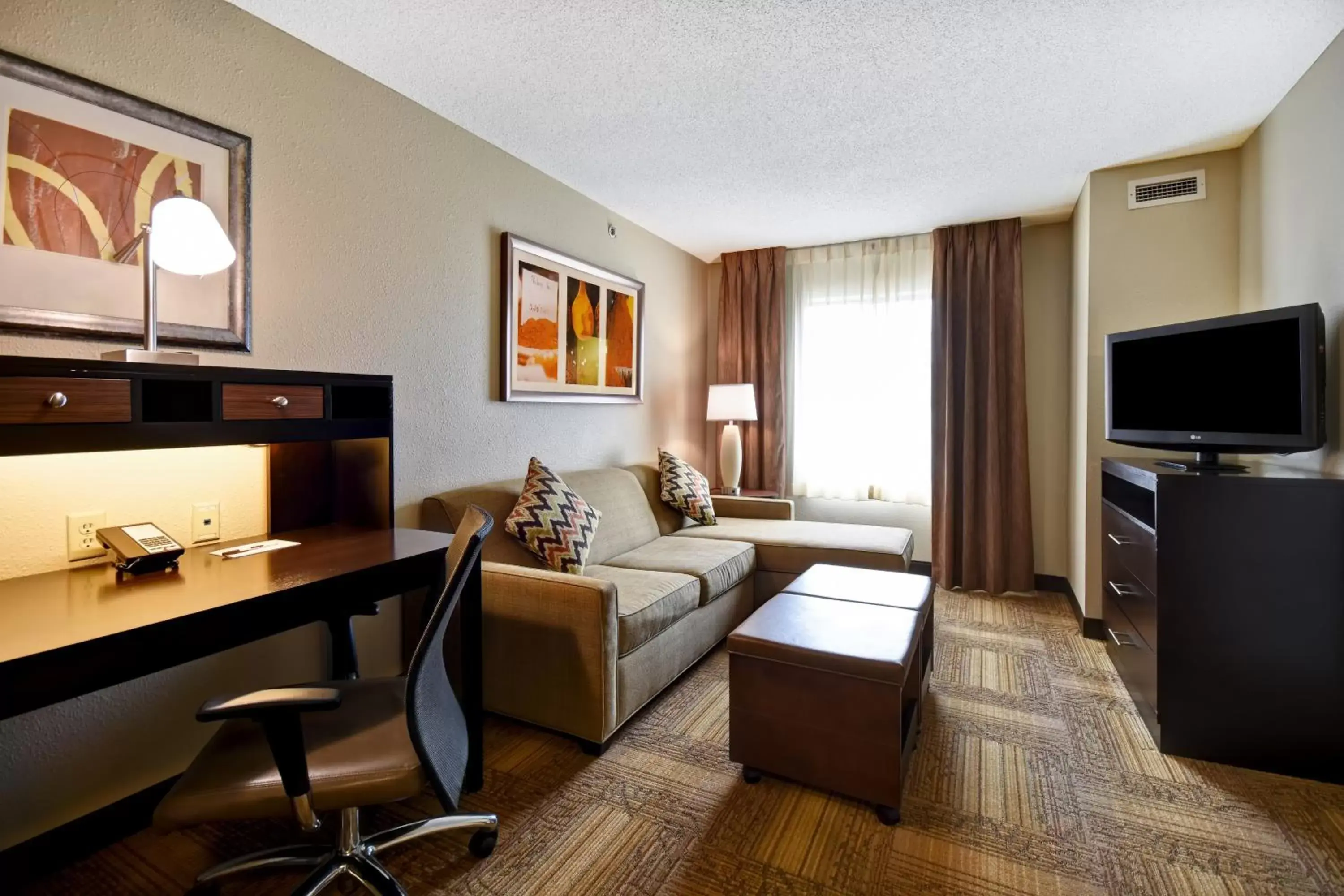 Photo of the whole room, Seating Area in Staybridge Suites Grand Rapids-Kentwood, an IHG Hotel