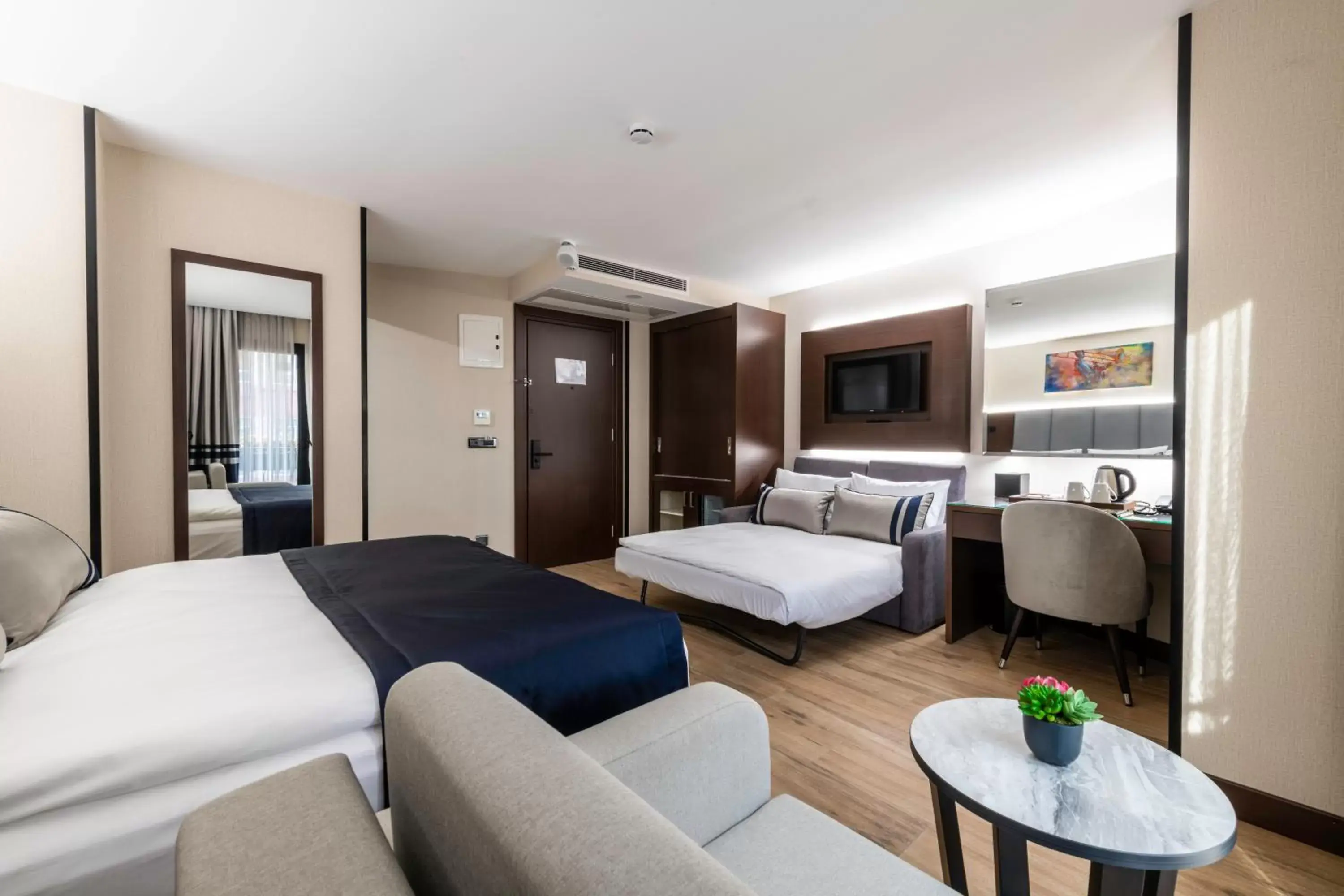 Bed in Aprilis Deluxe Hotel Bed in Aprilis Deluxe Hotel