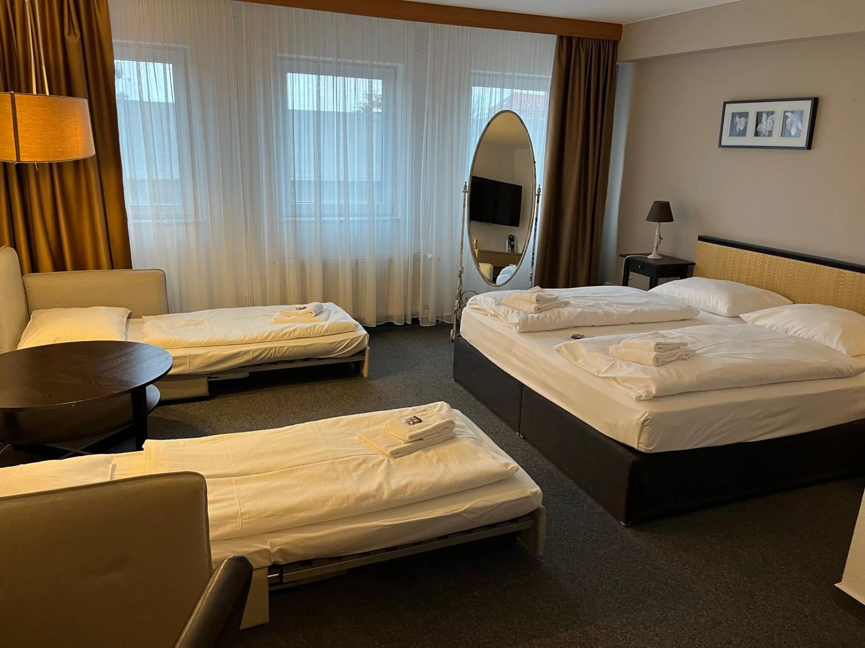 Photo of the whole room, Bed in astral'Inn Leipzig Hotel & Restaurant