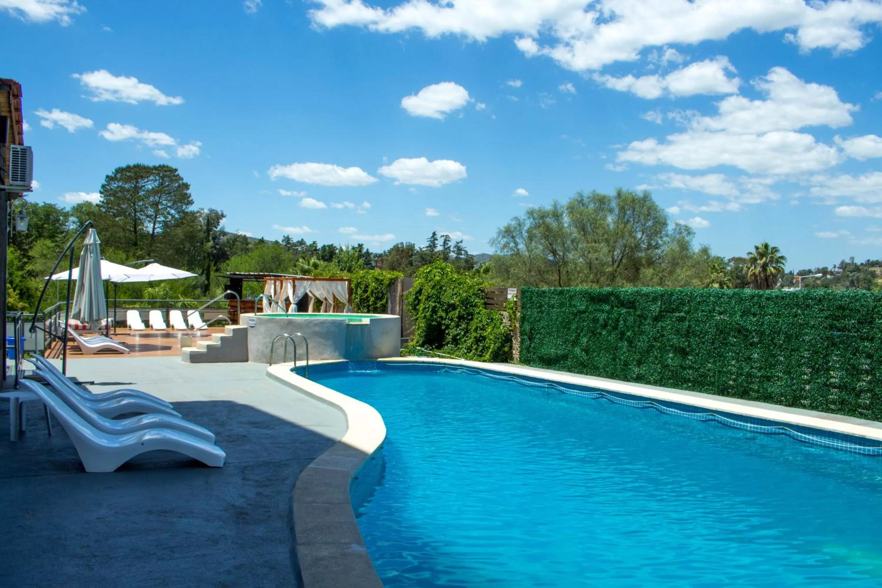 Day, Swimming Pool in Capri Hotel y Cabañas by CPH