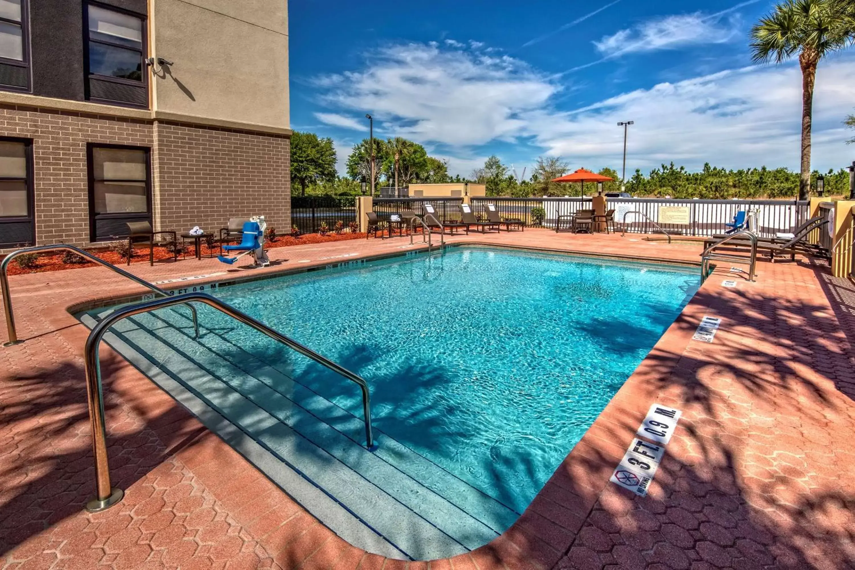 Pool view, Swimming Pool in Hampton Inn Orlando-Maingate South