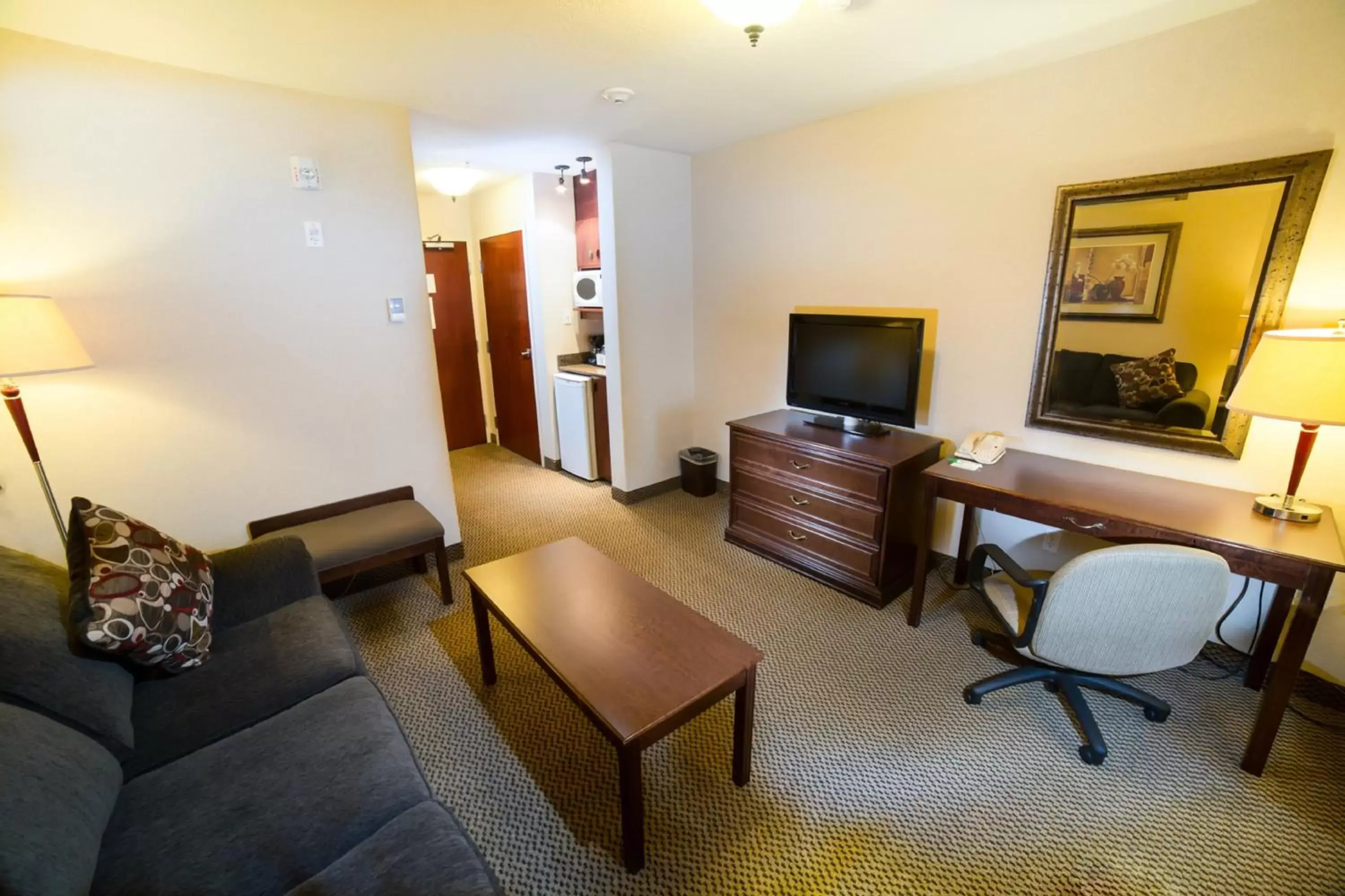 Bedroom, Seating Area in Holiday Inn Hotel & Suites-West Edmonton, an IHG Hotel