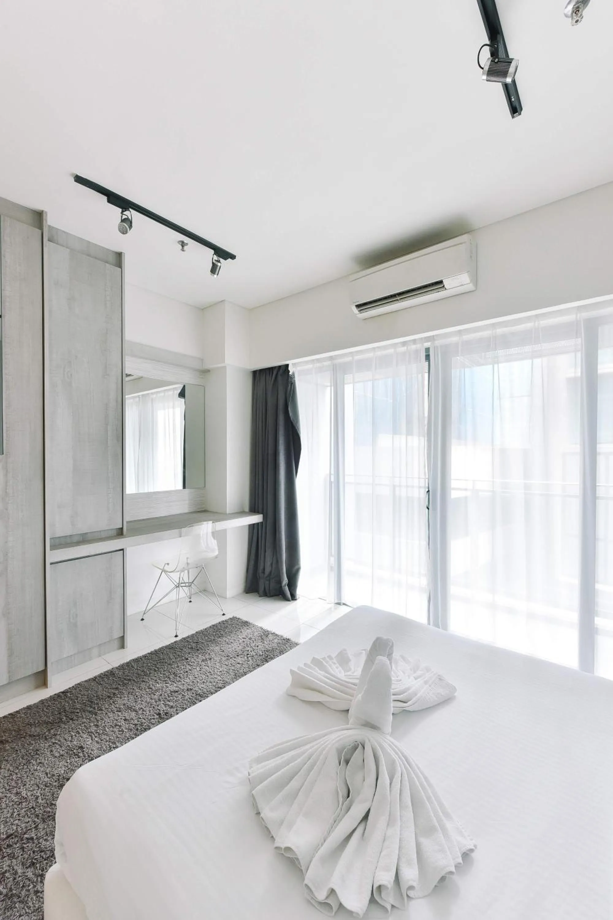 Bedroom in Summer Suites Residences by Subhome