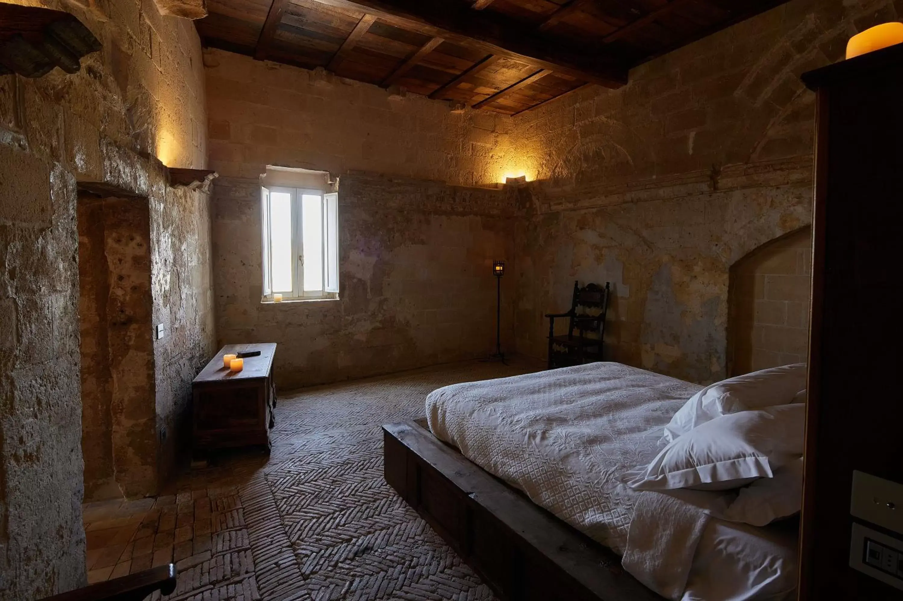 Photo of the whole room, Bed in Sextantio Le Grotte Della Civita